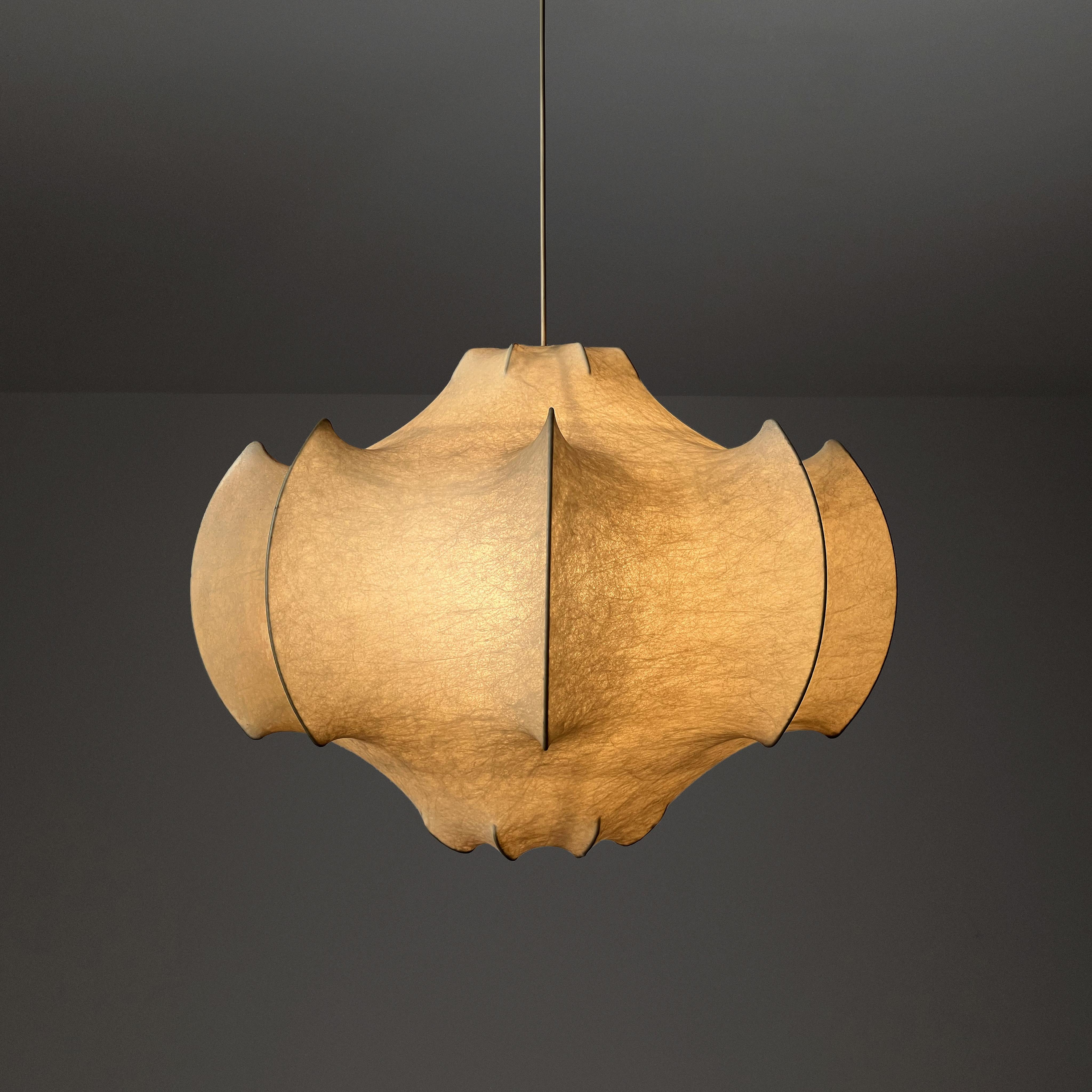 Crafted during the 1960s, this chandelier stands as a hallmark of Italian design, blending contemporary shapes with an organic, almost playful charm, sure to infuse any space with an aura of elegance and delight.

The 