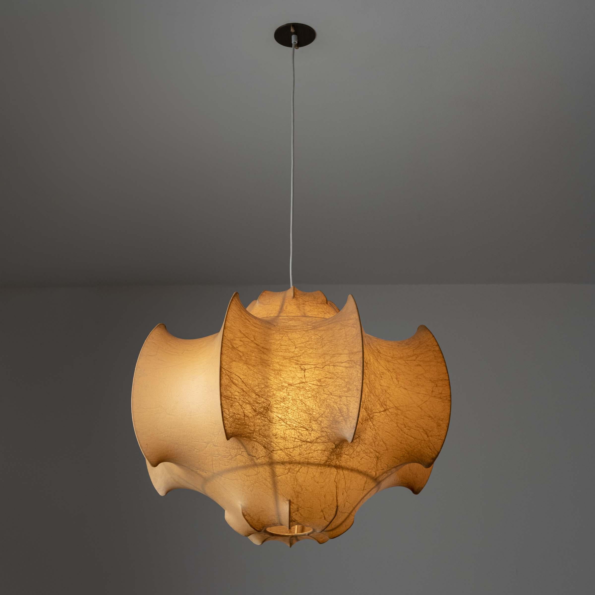 First edition Viscontea suspension light by Achille & Pier Castiglioni for Flos. Designed and manufactured in Italy, circa 1960's. Resin, steel, custom brass backplate. Wired for U.S. standards. We recommend one E27 60w maximum bulb. Bulb not