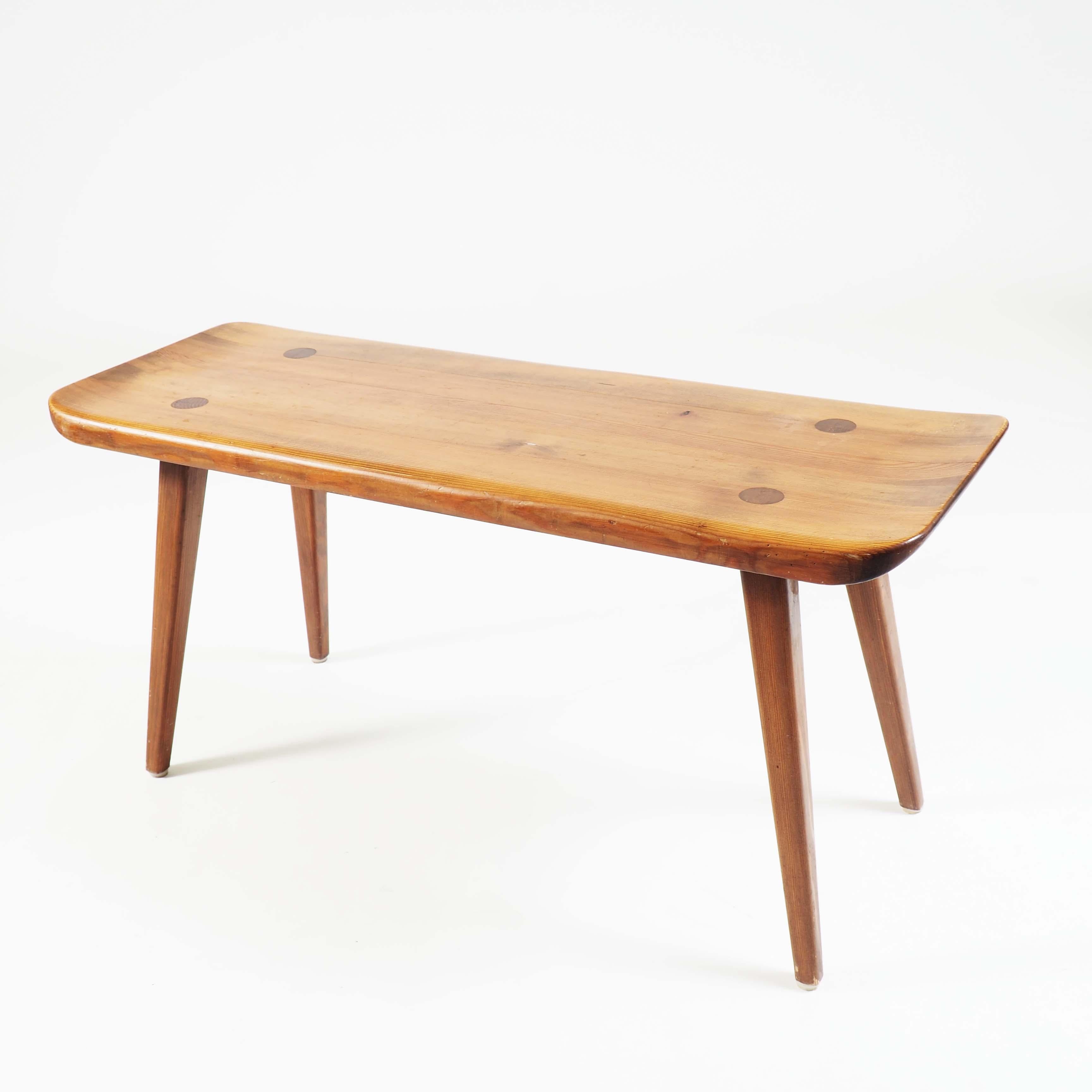 This small bench was designed by one of the real giants in Nordic design, Carl Malmsten. The bench is rustic, but elegant. It is made in solid pinewood, a material you not often see in Malmstens work.