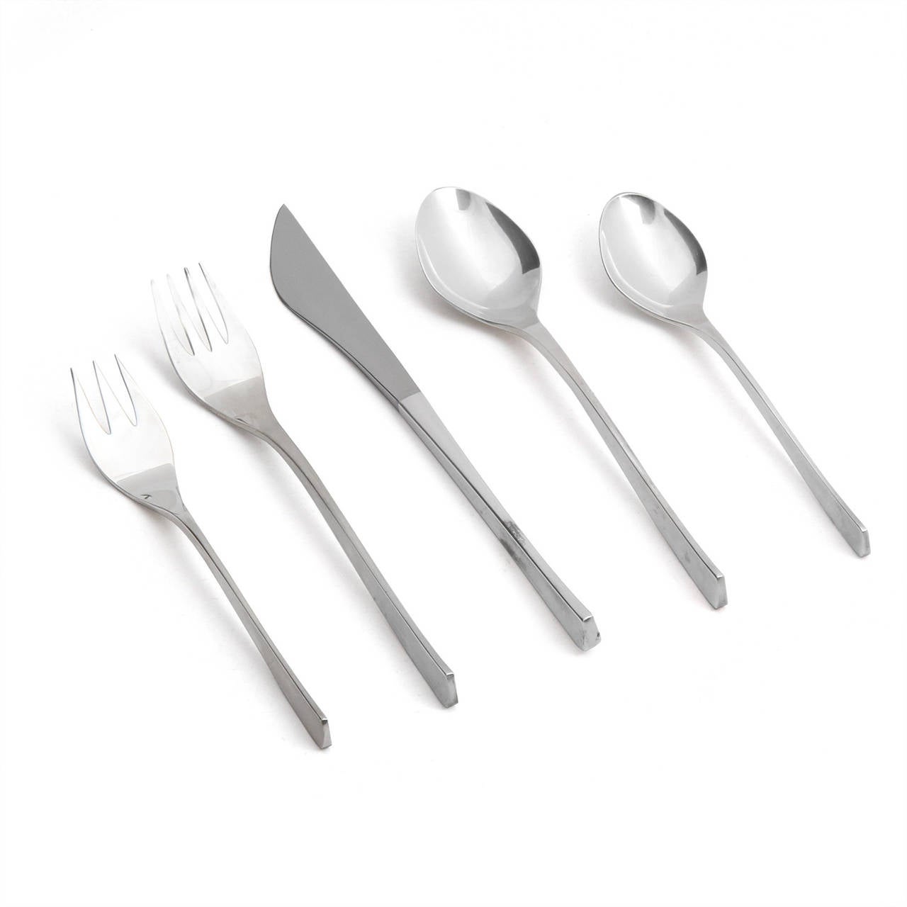 A service for twelve (12), of sculptural, Vision flatware in sterling created by the artist and jewelry designer Ronald Hayes Pearson. 
Place setting includes: salad fork, dinner fork, dinner knife, soup spoon and dessert spoon.