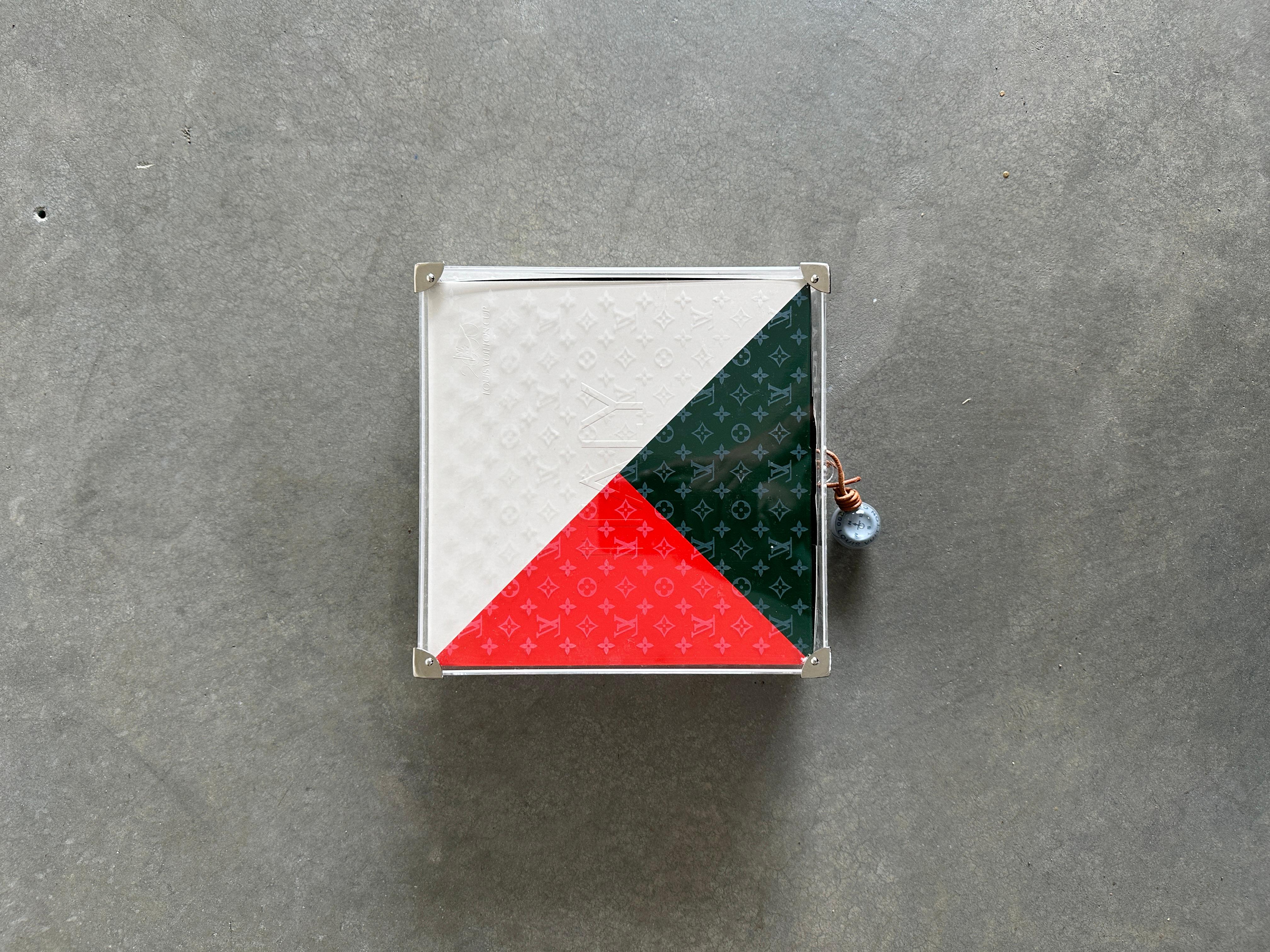From the Visionaire website:

30 GAME is not only a collection of art but also a game. Taking as our starting point the Louis Vuitton Challenge, the qualifying round of sailboat races for the America’s Cup, we assembled teams of artists,