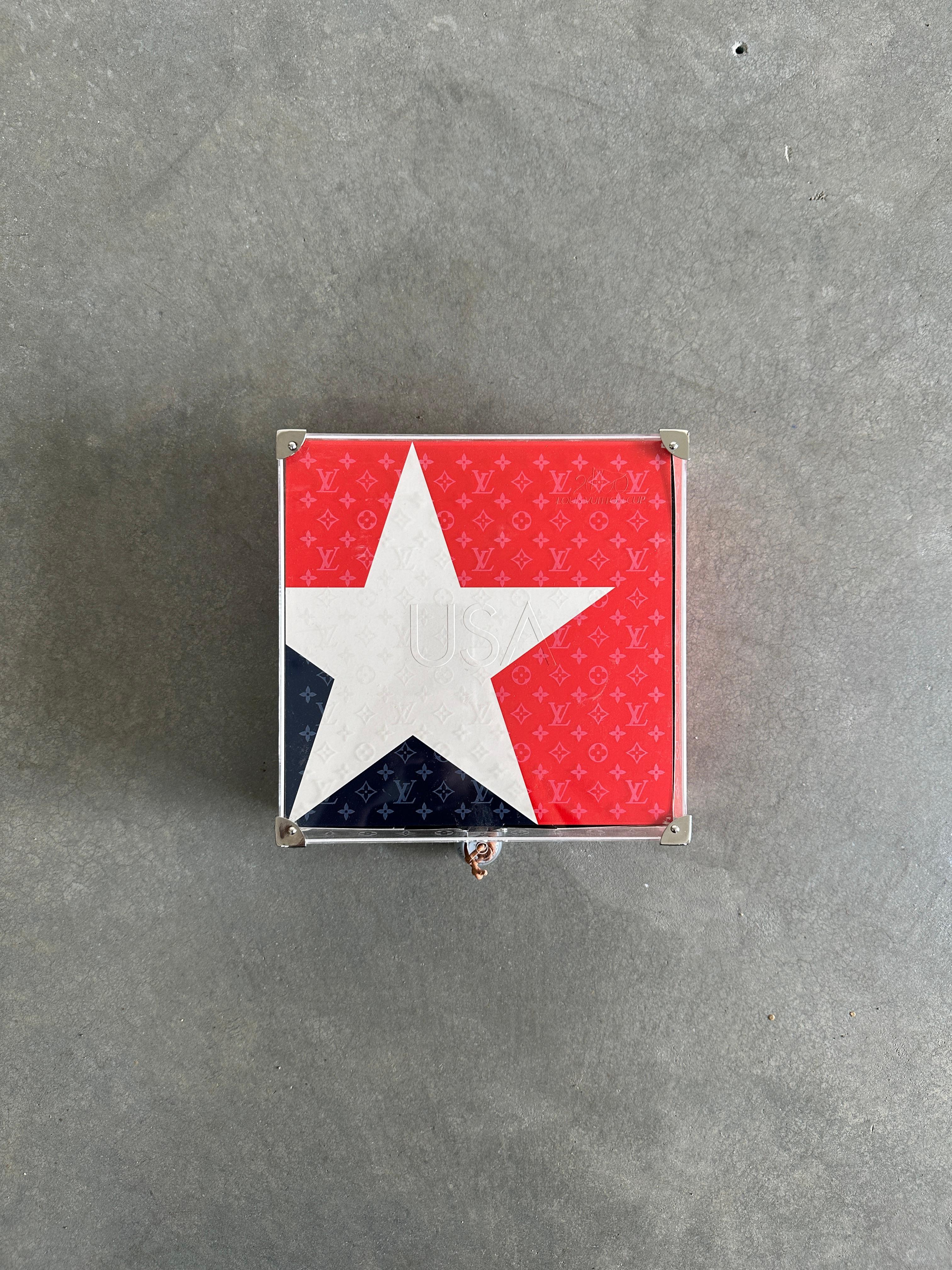 From the Visionaire website:

30 GAME is not only a collection of art but also a game. Taking as our starting point the Louis Vuitton Challenge, the qualifying round of sailboat races for the America’s Cup, we assembled teams of artists,