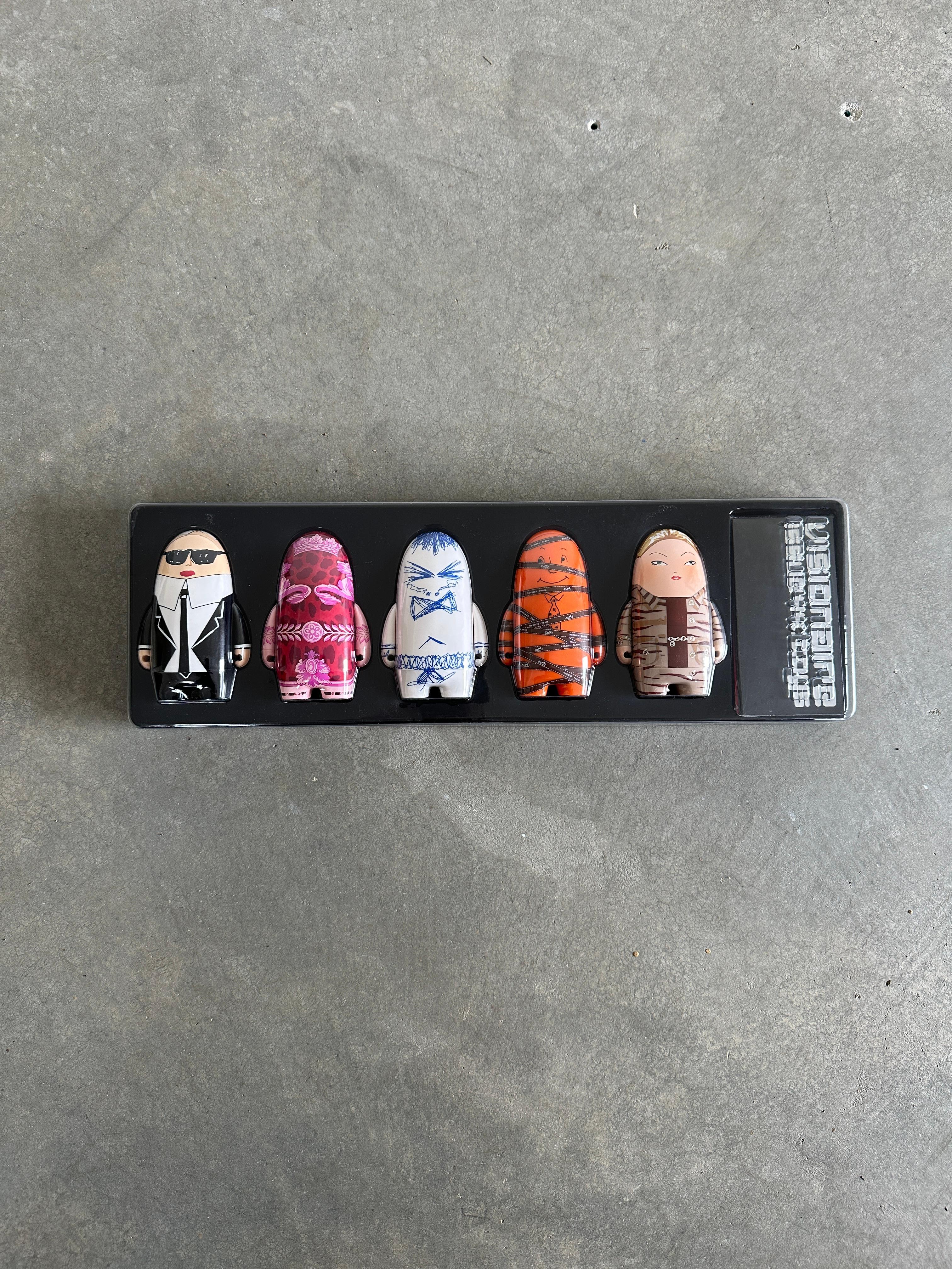 Limited edition, numbered 2598 of 4000 copies.

From the Visionaire website:

44 TOYS, in collaboration with Kidrobot, consists of ten humanoid characters created by designers like Karl Lagerfeld, Miuccia Prada, and Marc Jacobs for Louis Vuitton.