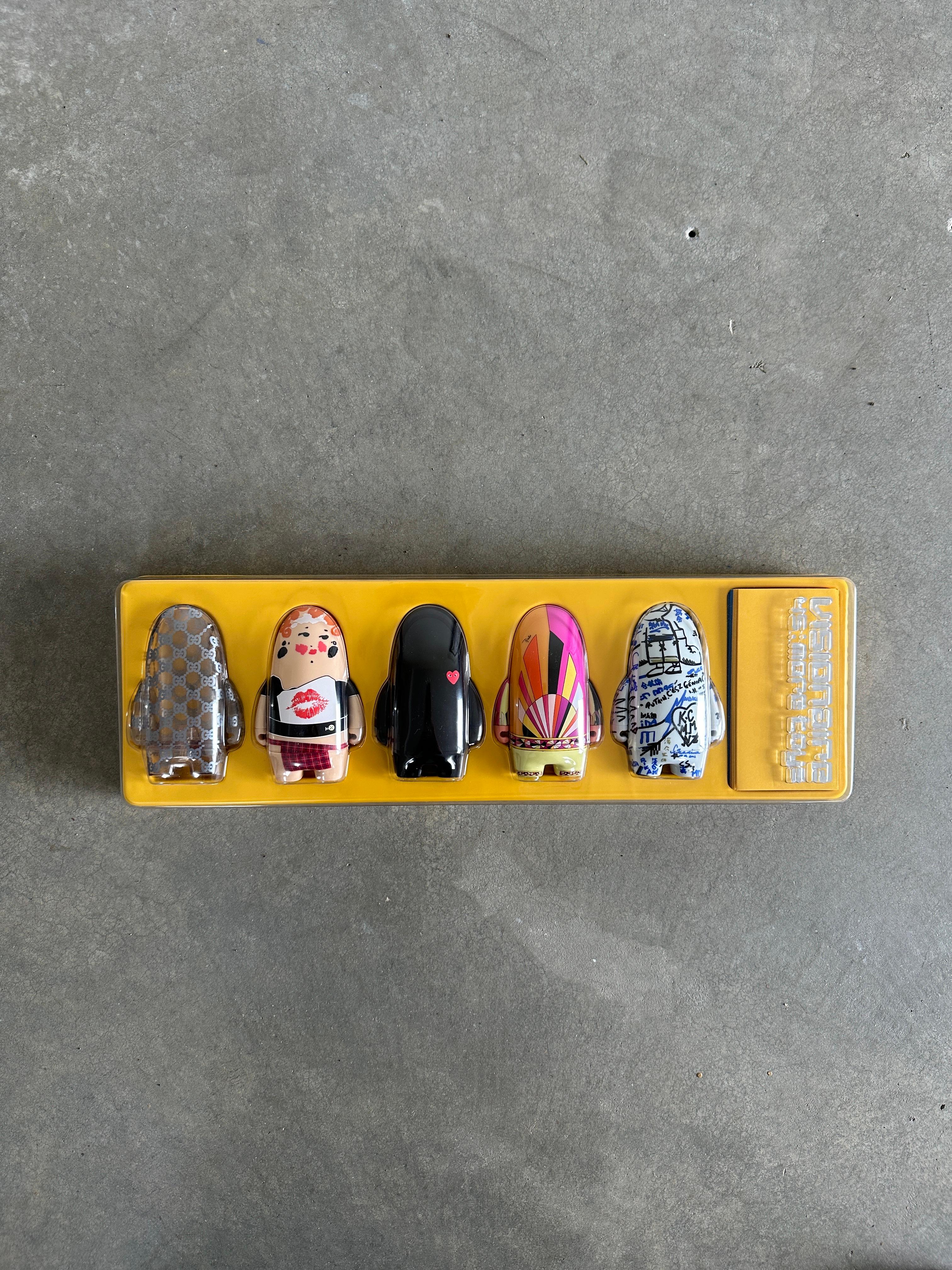 Limited edition, numbered 0553 of 4000 copies.

From the Visionaire website:

44 TOYS, in collaboration with Kidrobot, consists of ten humanoid characters created by designers like Karl Lagerfeld, Miuccia Prada, and Marc Jacobs for Louis Vuitton.