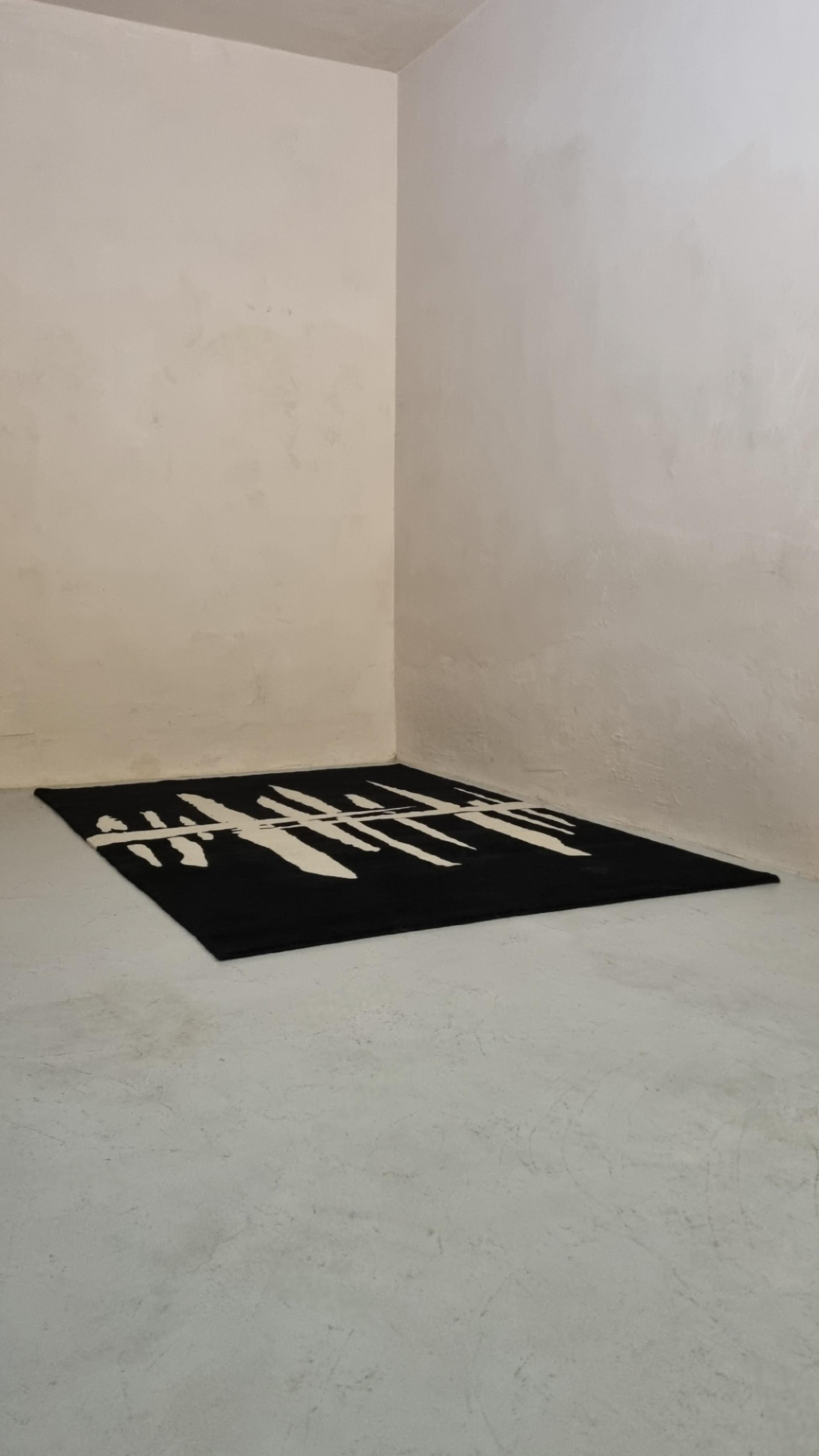 Rug conceived by the design mind Francesco Zotti for Seconda Giovinezza gallery, 2024.

Nepal knot, color 001 White and 600 Black
workmanship 60 line knot and soumak

carpet made entirely by hand
composition: 100% wool,

As the name suggests, the