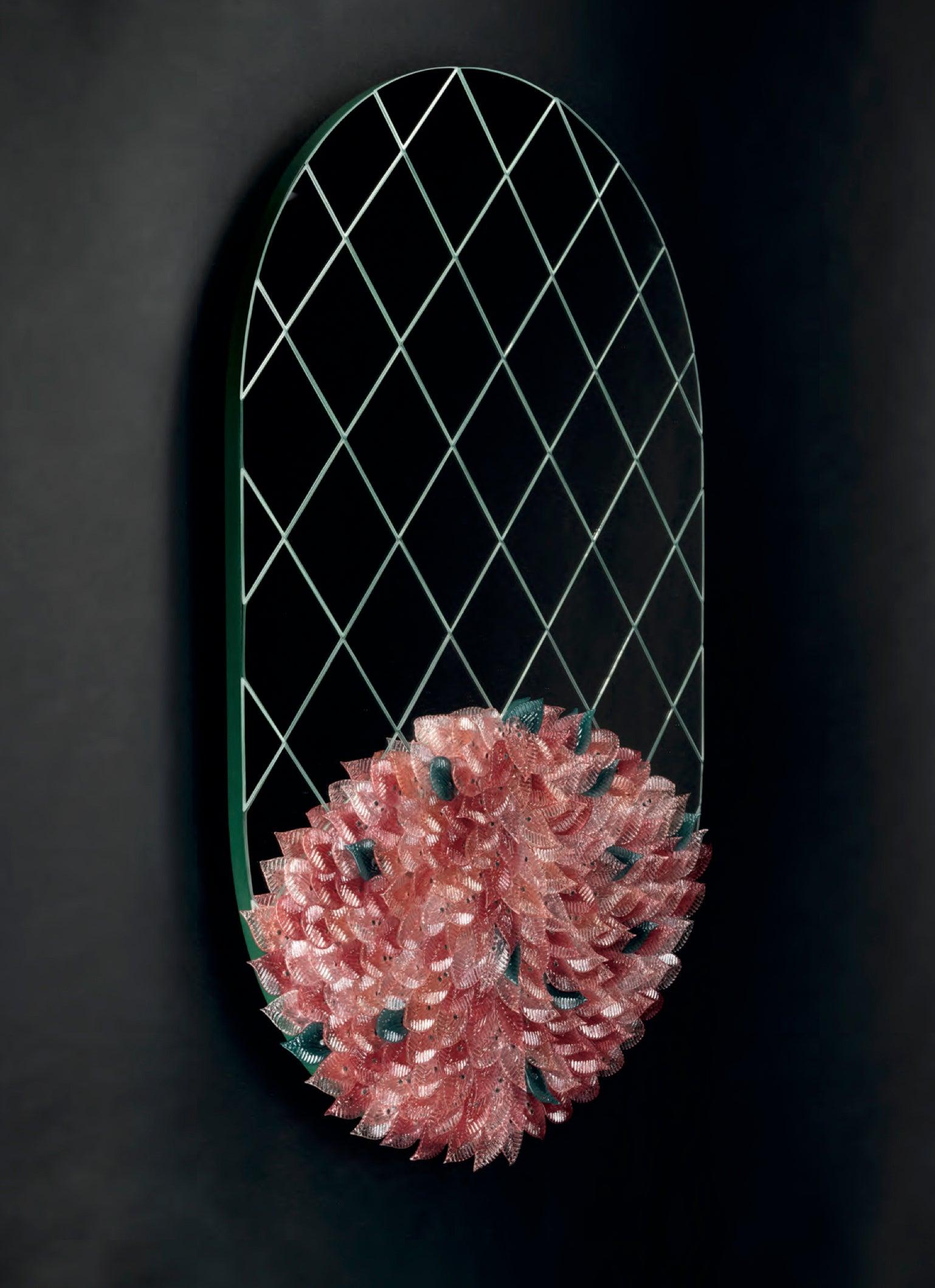 Mirror made with traditional methods of Murano, with application of handcrafted cut and ground silver mirrors and glass leaves applied by hand.