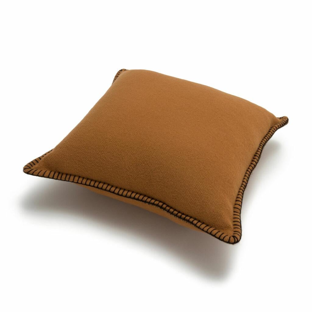 The most exquisite extra fine Australian Merino is handled by master carders, shearers, dyers and weavers to create a one of kind pillow unlike any other, ultra light and soft. Created in an artisanal weaving process keeping with a tradition that