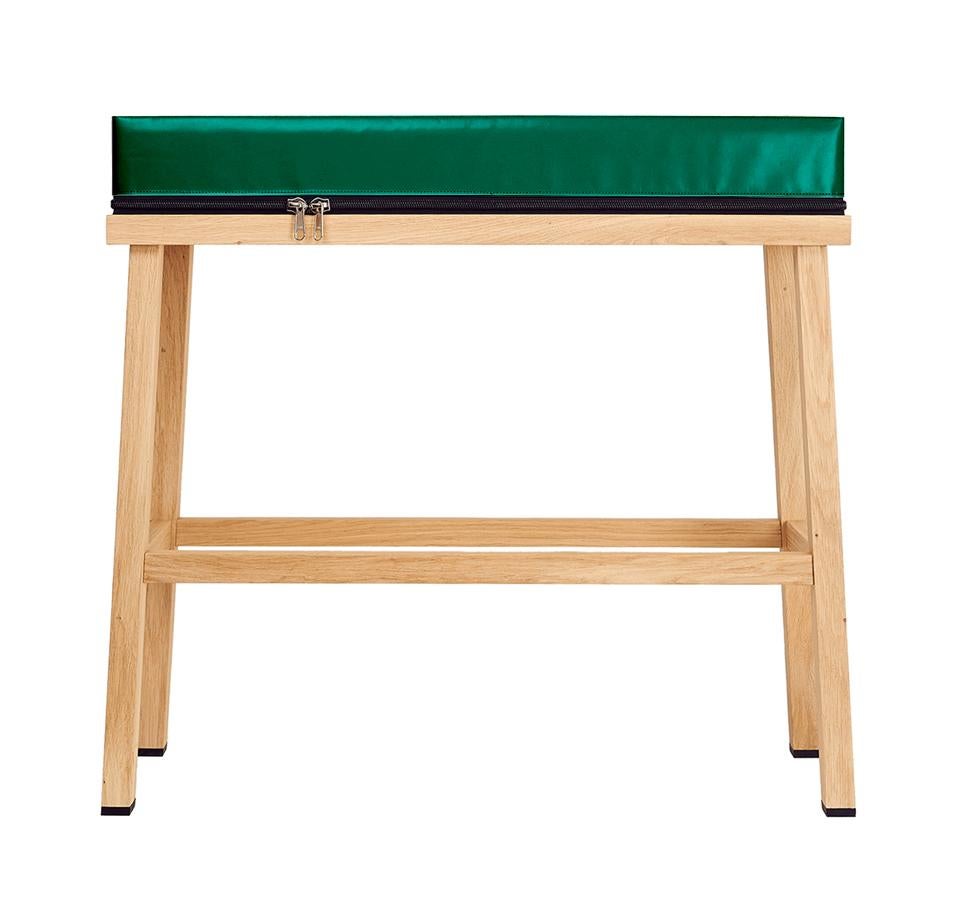 Visser and Meijwaard Truecolors high bench in green PVC cloth with zipper 

Designed by Visser en Meijwaard
Contemporary, Netherlands, 2015
PVC cloth, oakwood, rubber
Measures: H 32 in, W 33.5 in, D 12 in

Cushion can be detached from the