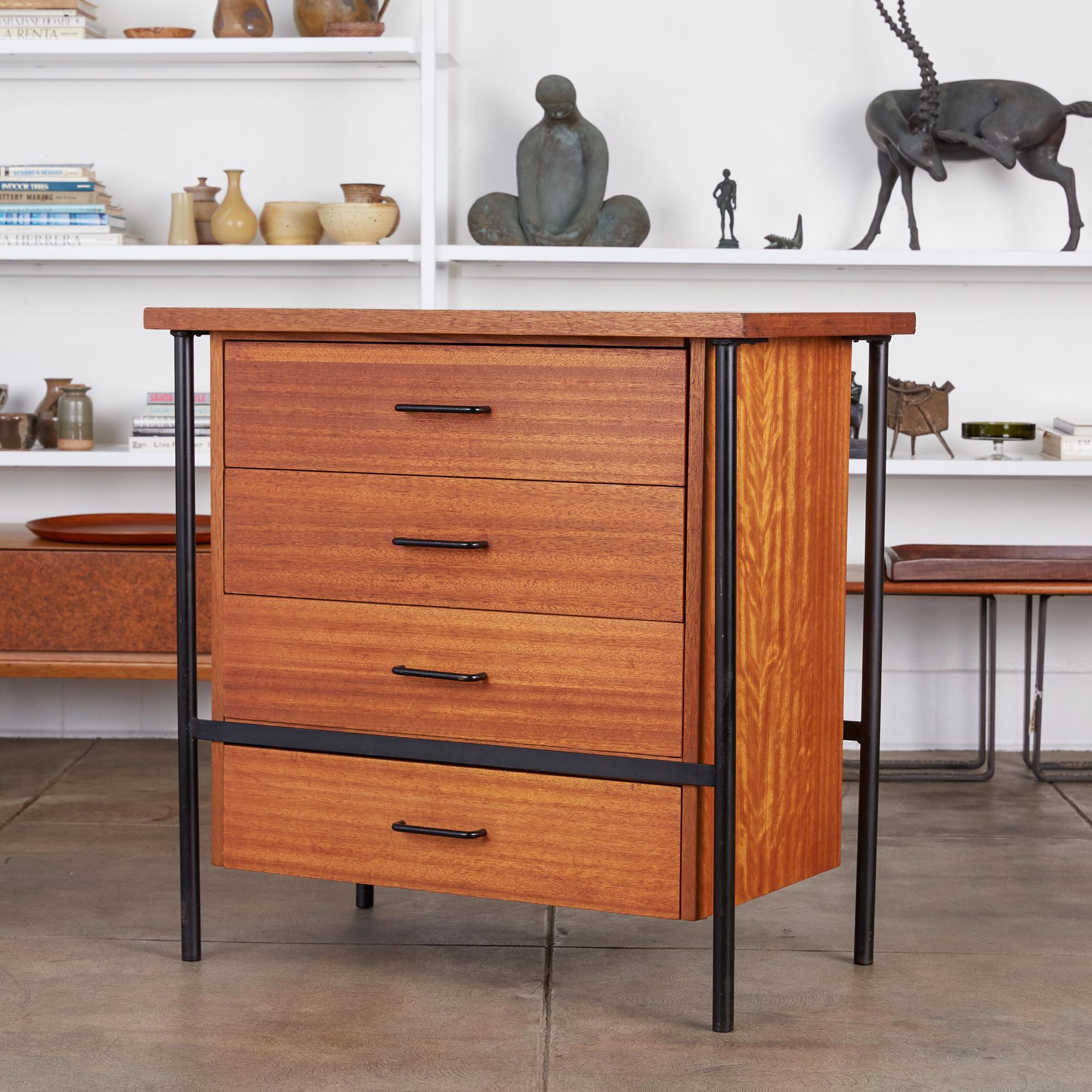 Dresser by Don Knorr for Vista of California, circa 1950s. This four-drawer dresser features a mahogany case with painted steel drawer pulls and tubular steel frame. Don Knorr attended Cranbrook after obtaining an architecture degree and went on to