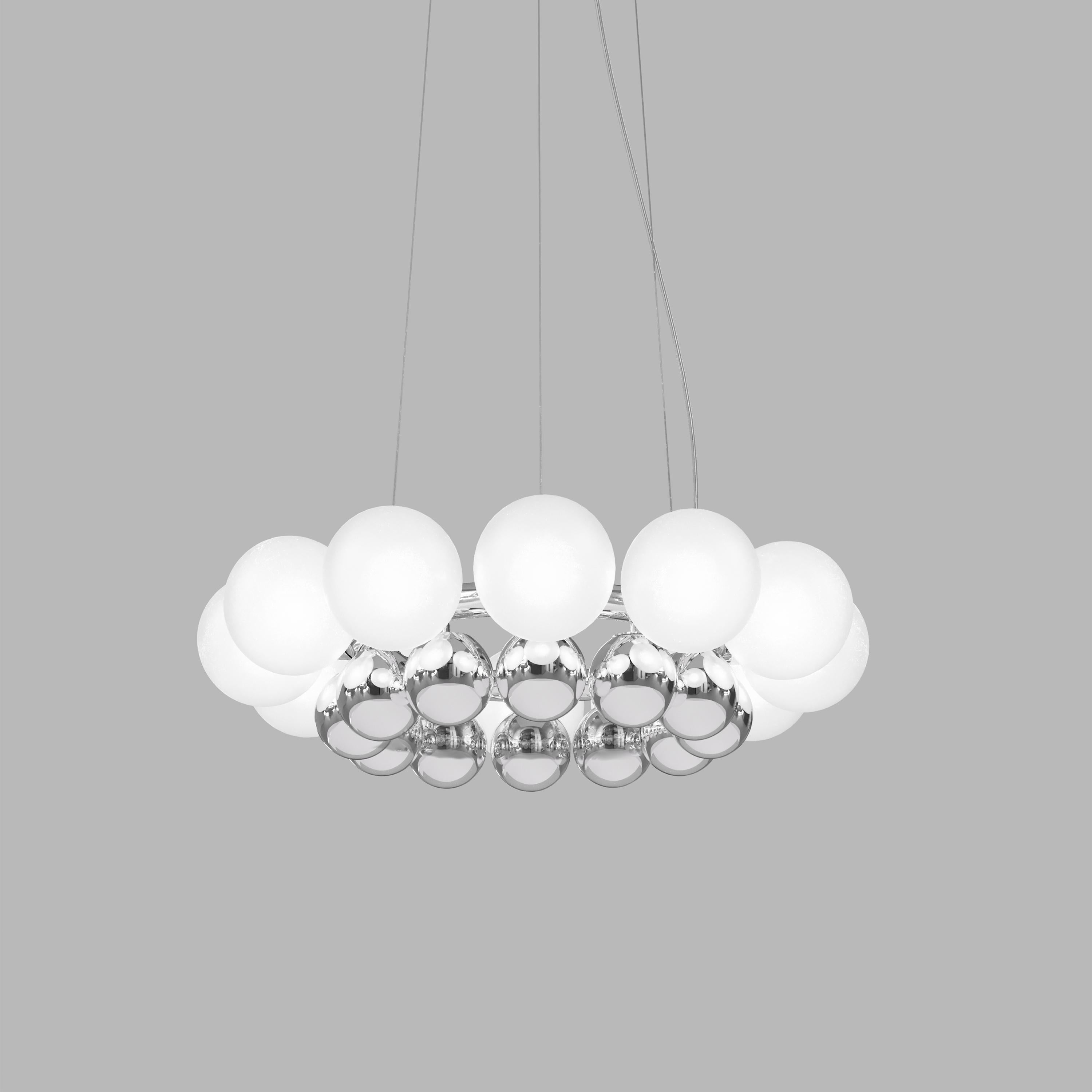 A composition made with two series of blown glass spheres in chrome and white colors and arranged in a two level ring that creates a kaleidoscopic effect of light and reflection. 

Specifications: 
Light source: G9
No of bulbs: 12×33W