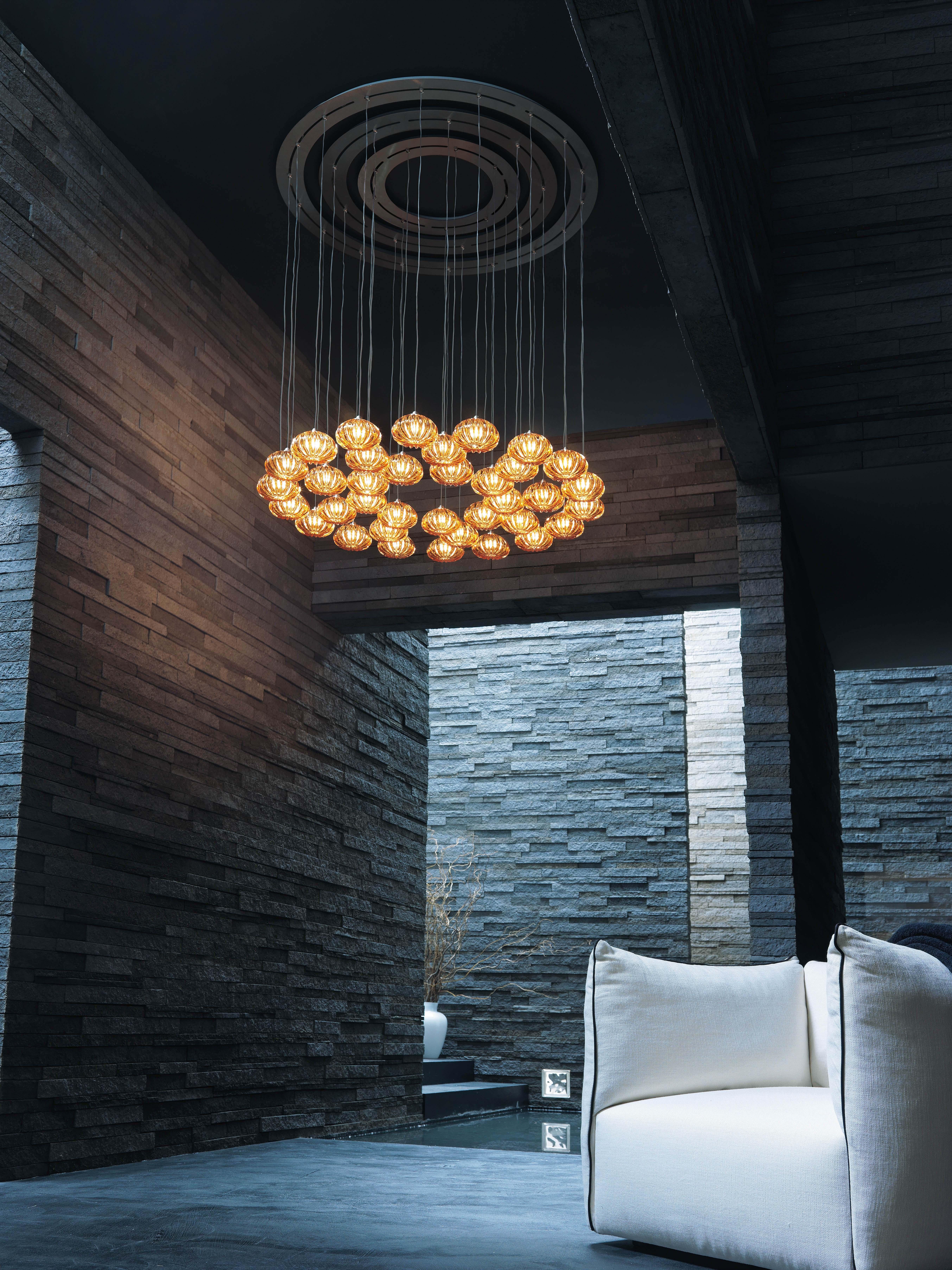 Great versatility for this creation made with a totally handcrafted production. Diamante is available in three sizes and can be used as pendant, sconce, ceiling, table and floor lamp or as part of a cluster. 

Specifications:
Light Source: G9
No