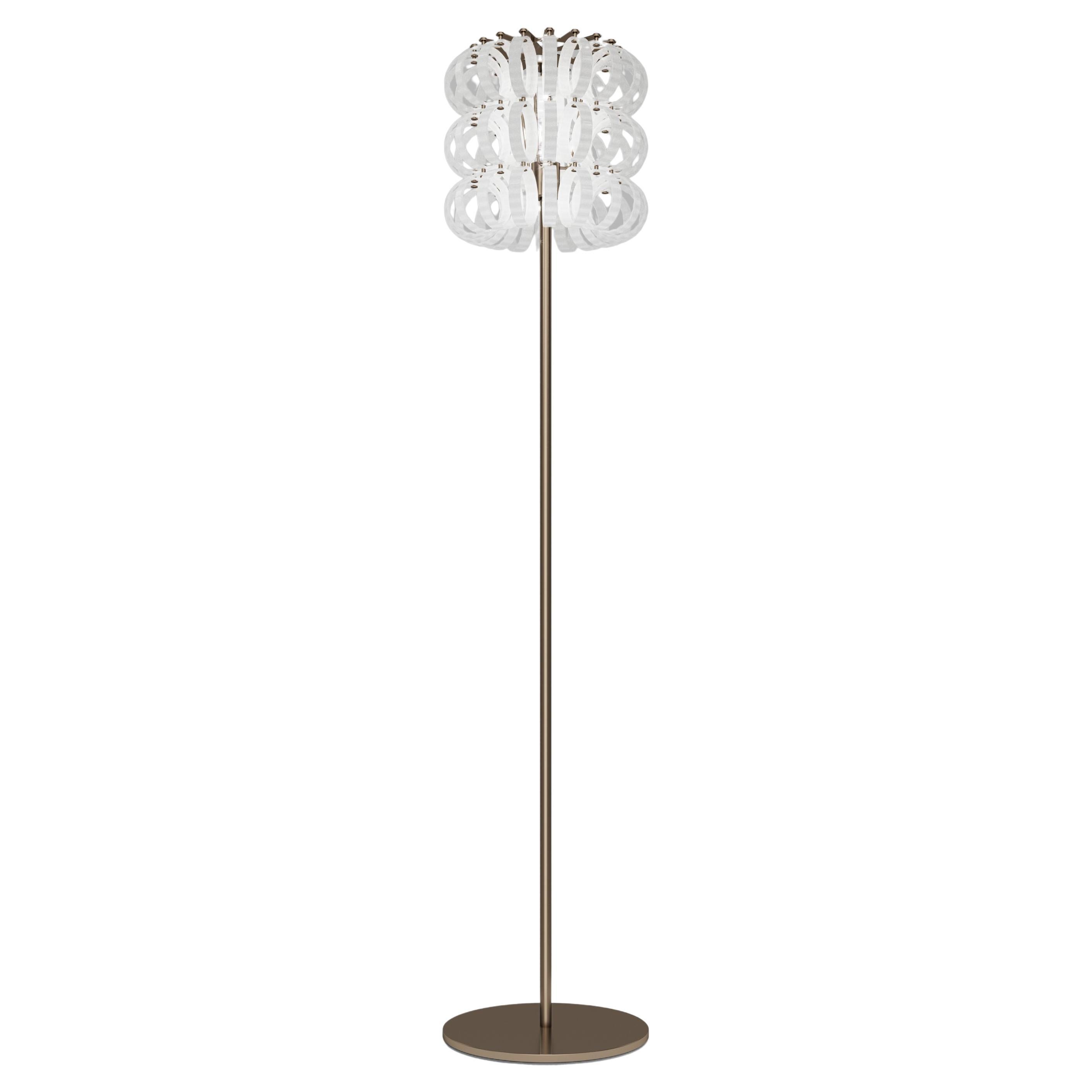 Lampadaire Vistosi Ecos en verre à rayures blanches avec cadre en bronze mat