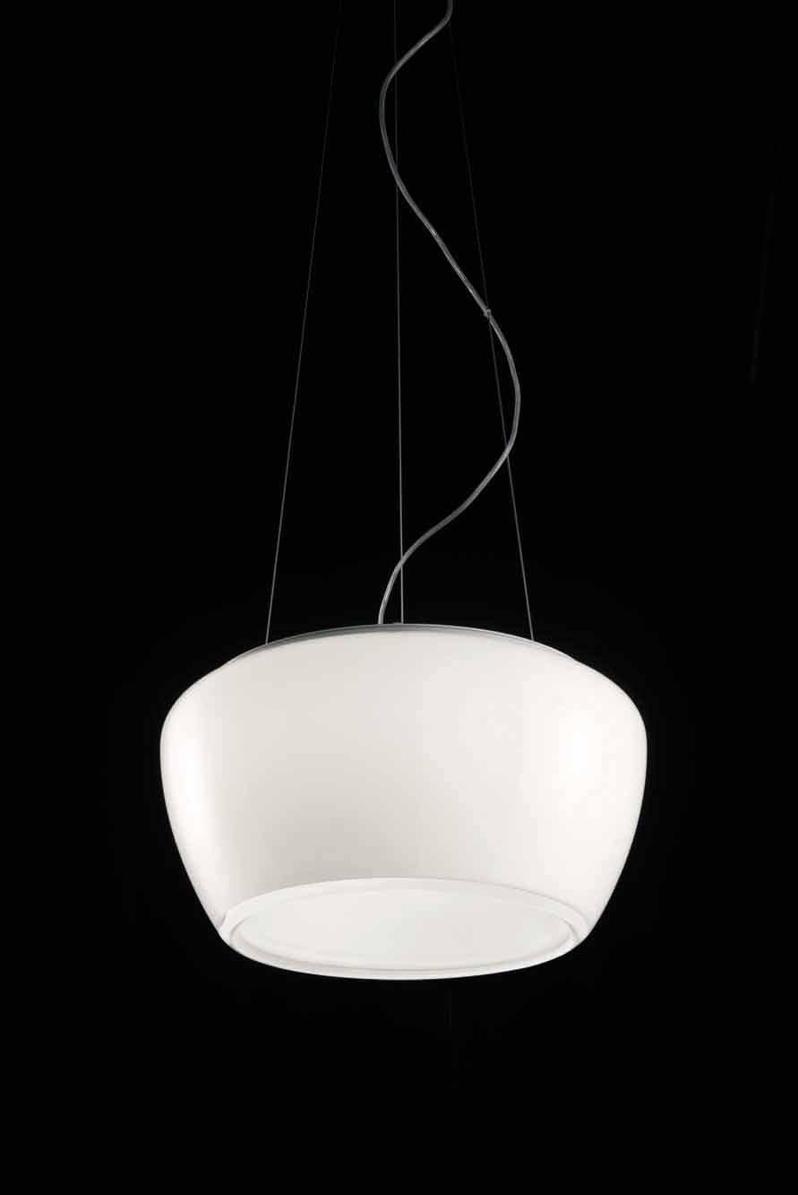 Pendant light that represents the illusion of a surface created by the implosion of volume. The glass, due to the thickness; shows a gradation of multiple layers of white and transparent crystal. LED dimmable lighting. Dimensions are in reference to
