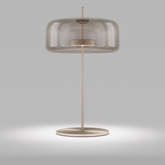 Lampada da tavolo Vistosi Jube in vetro trasparente fumé e finitura oro opaco