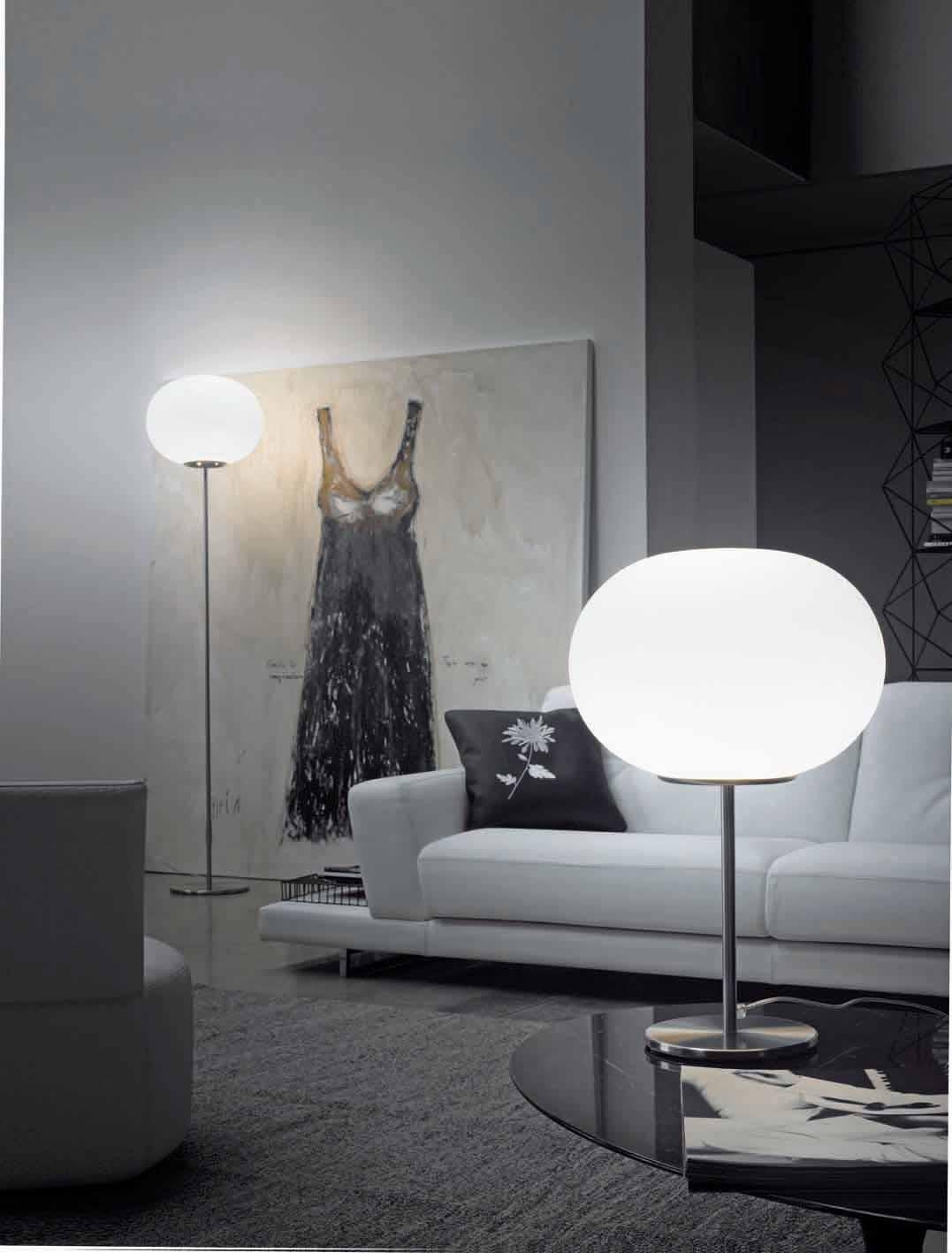 Floor lamp with oval and mouth-blown satin glass shade. LED dimmable lighting.

  