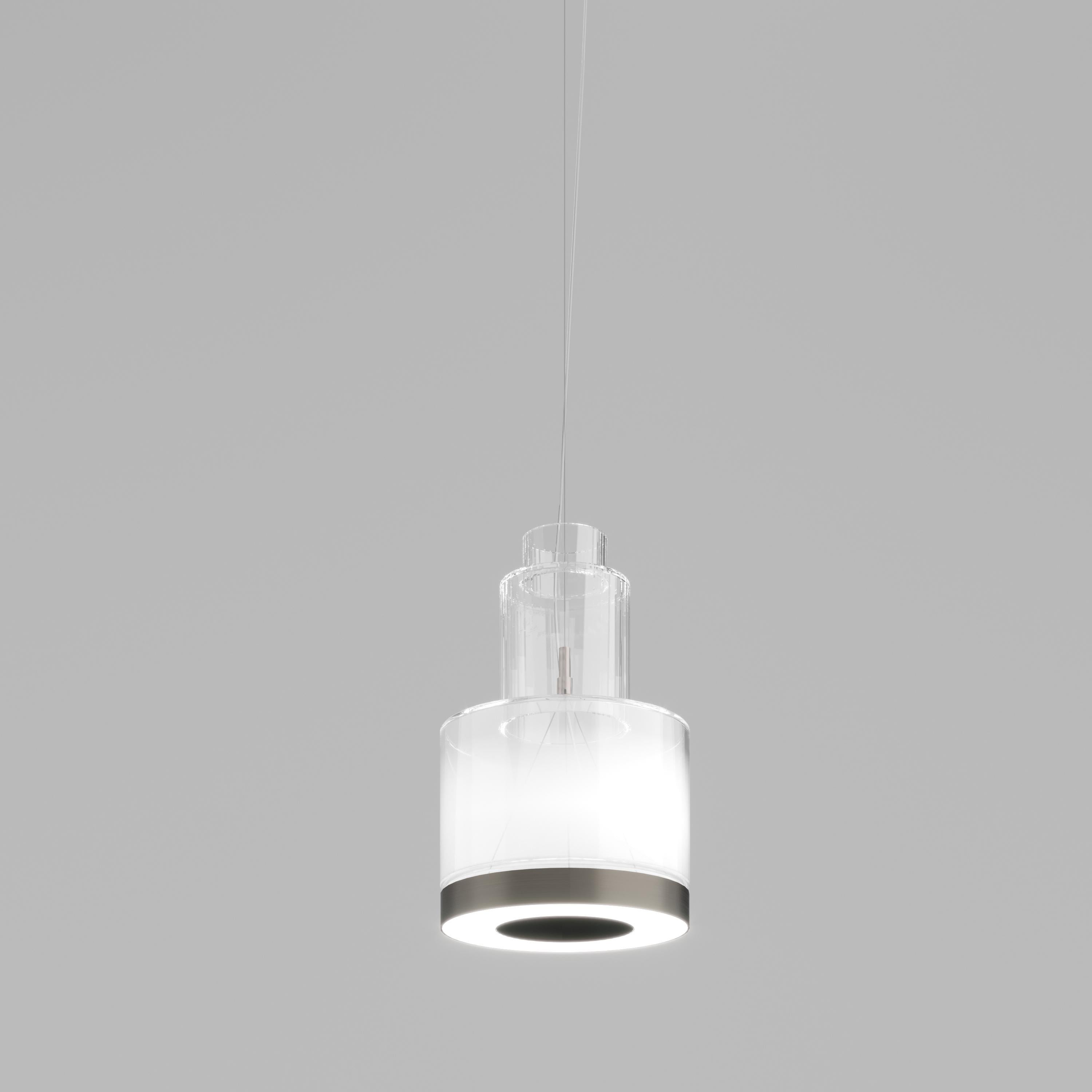 The Medea collection is characterized by geometric and simple shapes. The LED source illuminates the surface and the glass at the same time, bringing towards the ceiling a part of the soft-colour light. Mounted in clusters or individually, they show