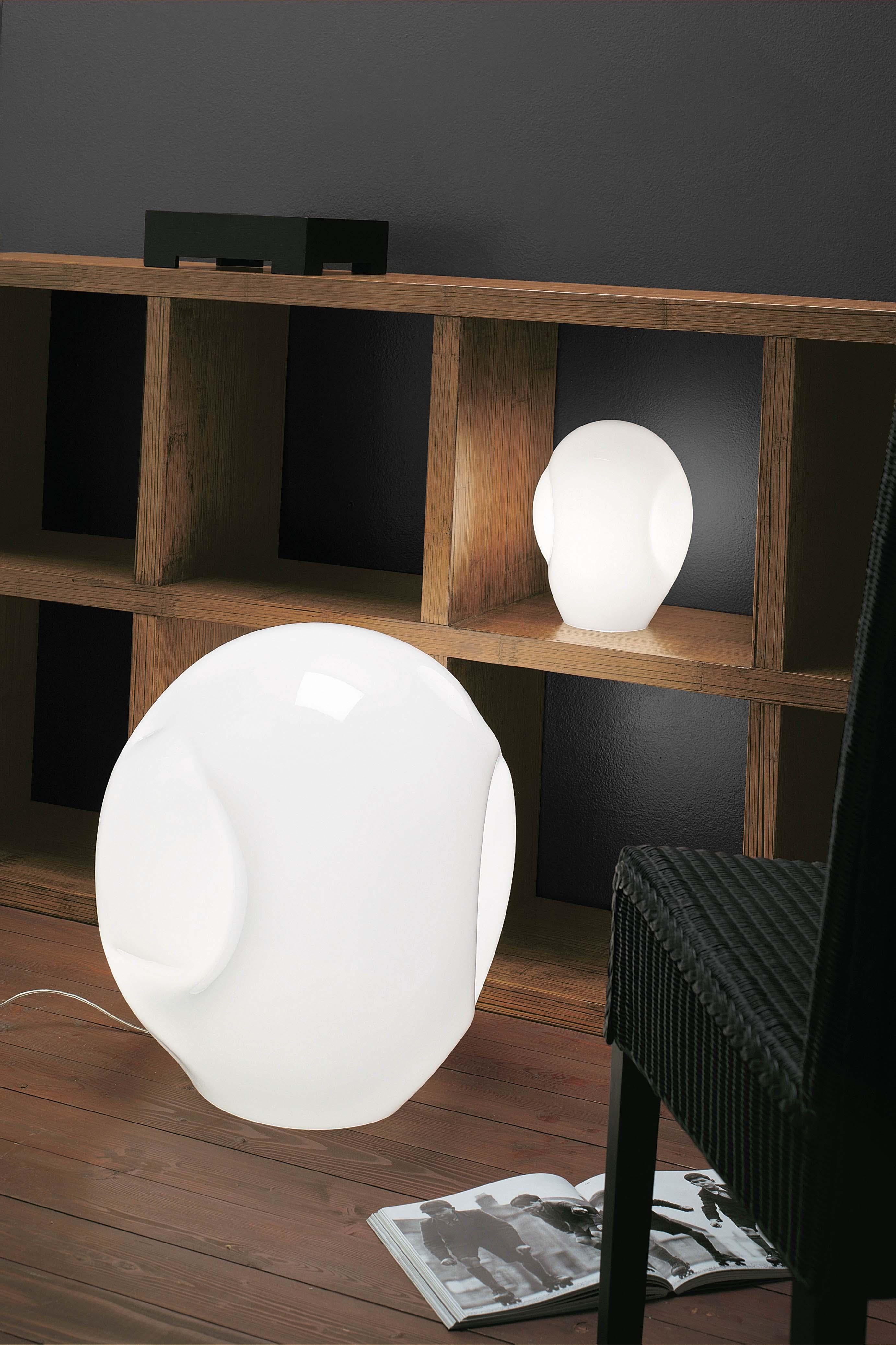 Collection of blown glass, freehand-modelled lamps that create an iconic Vistosi shape. 

Specifications: 
Light source: E12
No of bulbs: 1×40W E12
Dimmer: DIM 4.
 