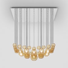 Lampe à suspension Vistosi en verre rayé ambré et cadre en acier miroir