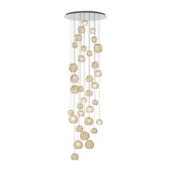 Lampe à suspension Vistosi en verre rayé ambré et cadre en acier miroir