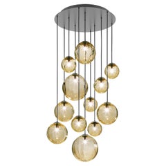 Vistosi Puppet Multipendant Light in vetro trasparente ambrato e cornice nera opaca