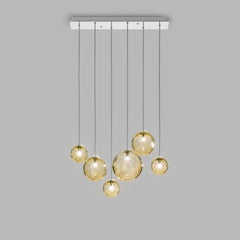 Vistosi Puppet Pendant Light in Amber Transparent Glass And Glossy Chrome Frame