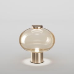 Vistosi Riflesso Table Lamp in Amber Transaprent Glass And Matt Gold Frame