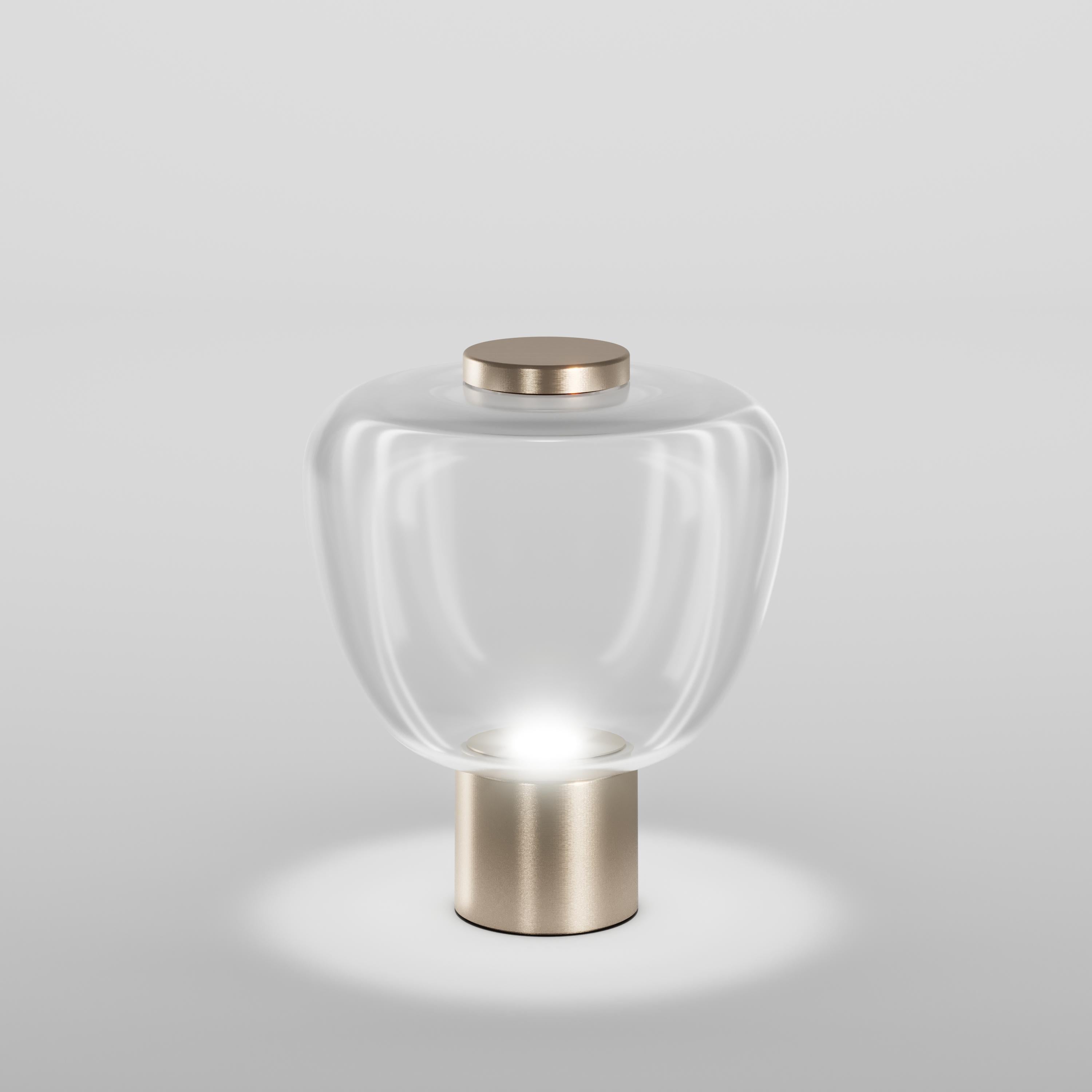 In the Riflesso collection the simplicity and lightness of glass become the main features with three different sinuous shapes. The silhouettes of the diffuser are enhanced by the LED light source.

Specifications:
Material: Glass
Light source: LED