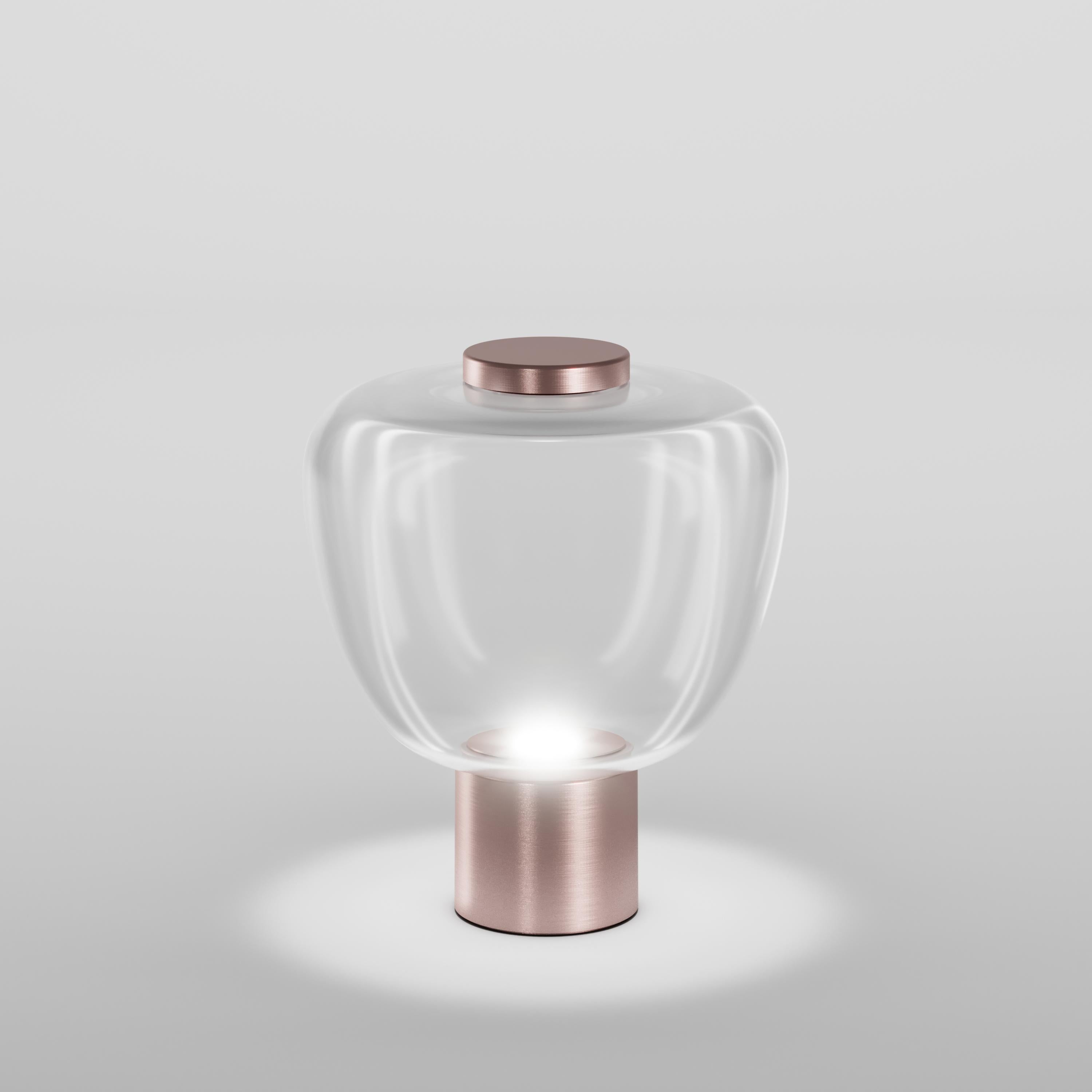 In the Riflesso collection the simplicity and lightness of glass become the main features with three different sinuous shapes. The silhouettes of the diffuser are enhanced by the LED light source.

Specifications:
Material: Glass
Light source: