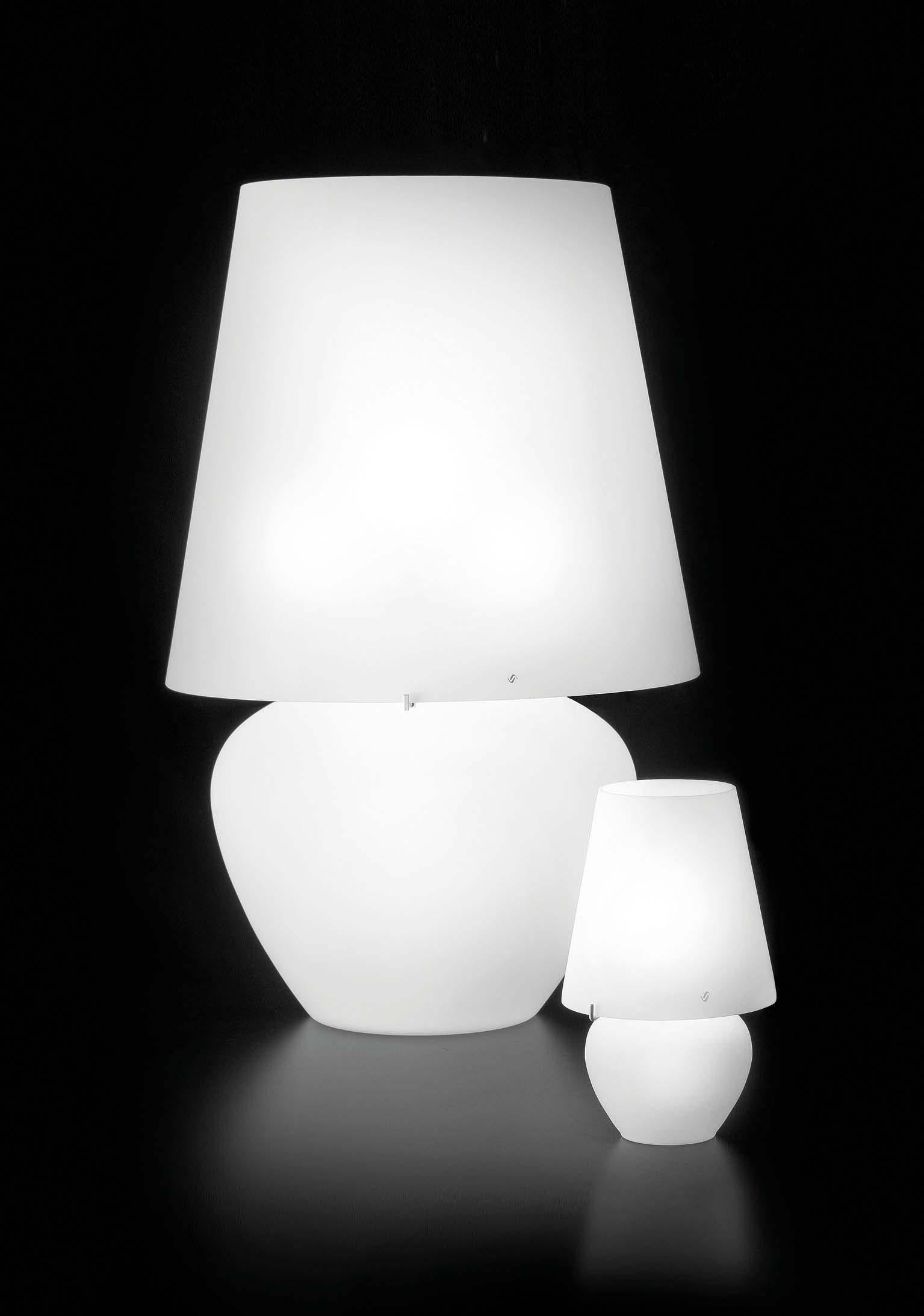 A collection of table lamps, pendants and floor lamps with a recognizable design that maximizes the quality of the matt-finish glass. 

Specifications: 
Light source: E12
No of bulbs: 1×40W E12 + 1×25W E12
Dimmer: DIM 4
Frame finish: Glossy