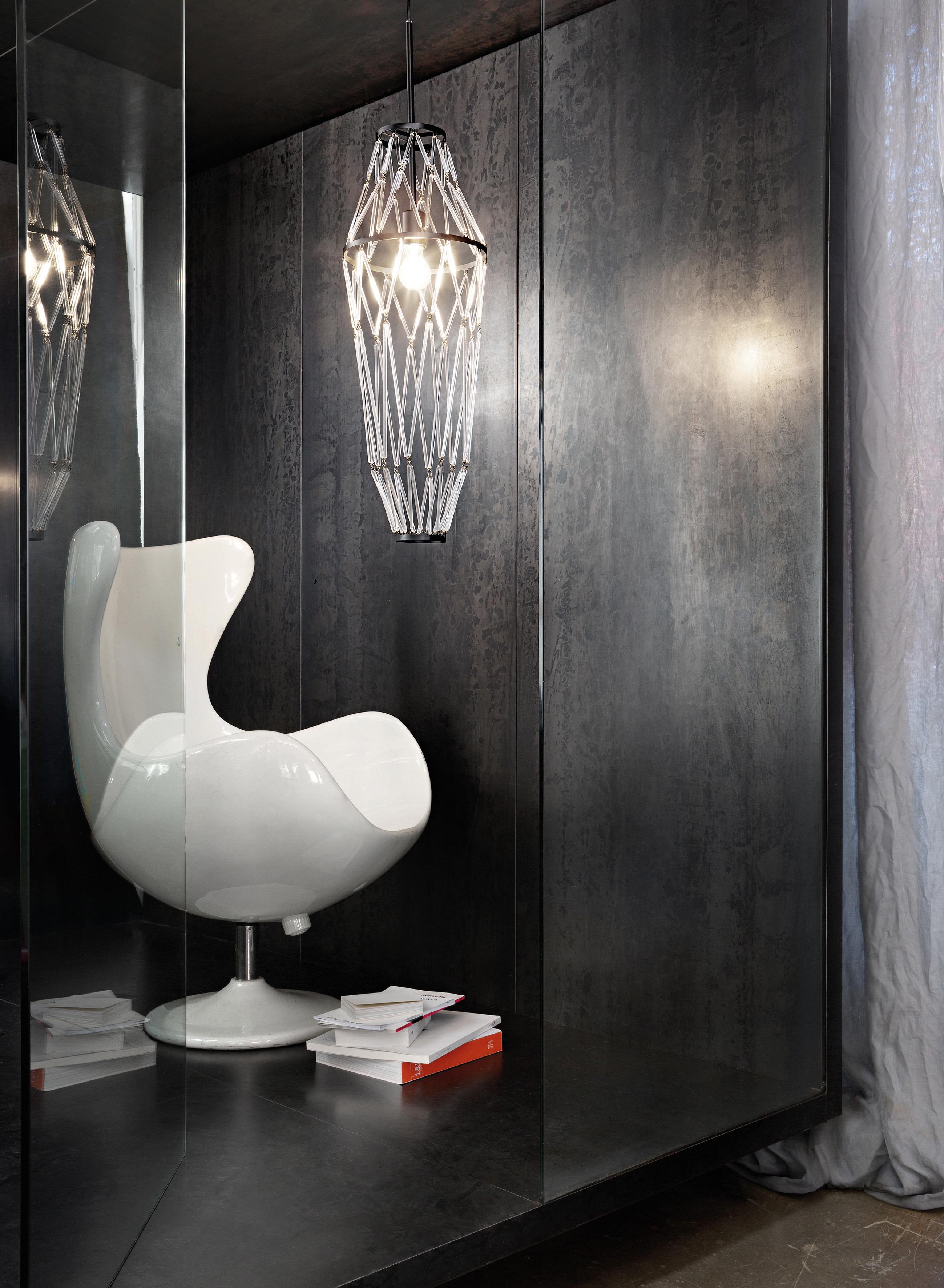 Infinite crystal wefts allow to realize the preferred compositions and to change them anytime on request. 

Specifications:
Light source: E26
No of bulbs: 1×60W E26
Dimmer: DIM 1
Measure: Cable length maximum: 120 cm.