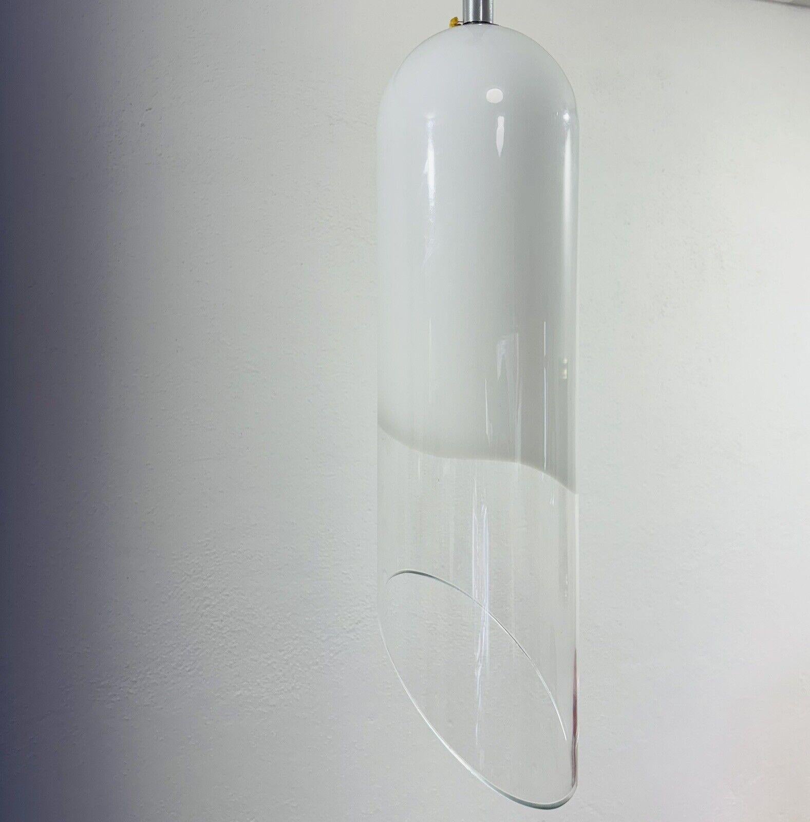1970s-Wonderful and very rare hanging lamp vistosi production.

All-glass diffuser made of two-tone white/transparent glass.

The item is in excellent conservative condition; there are no cosmetic or structural defects to report. (SEE