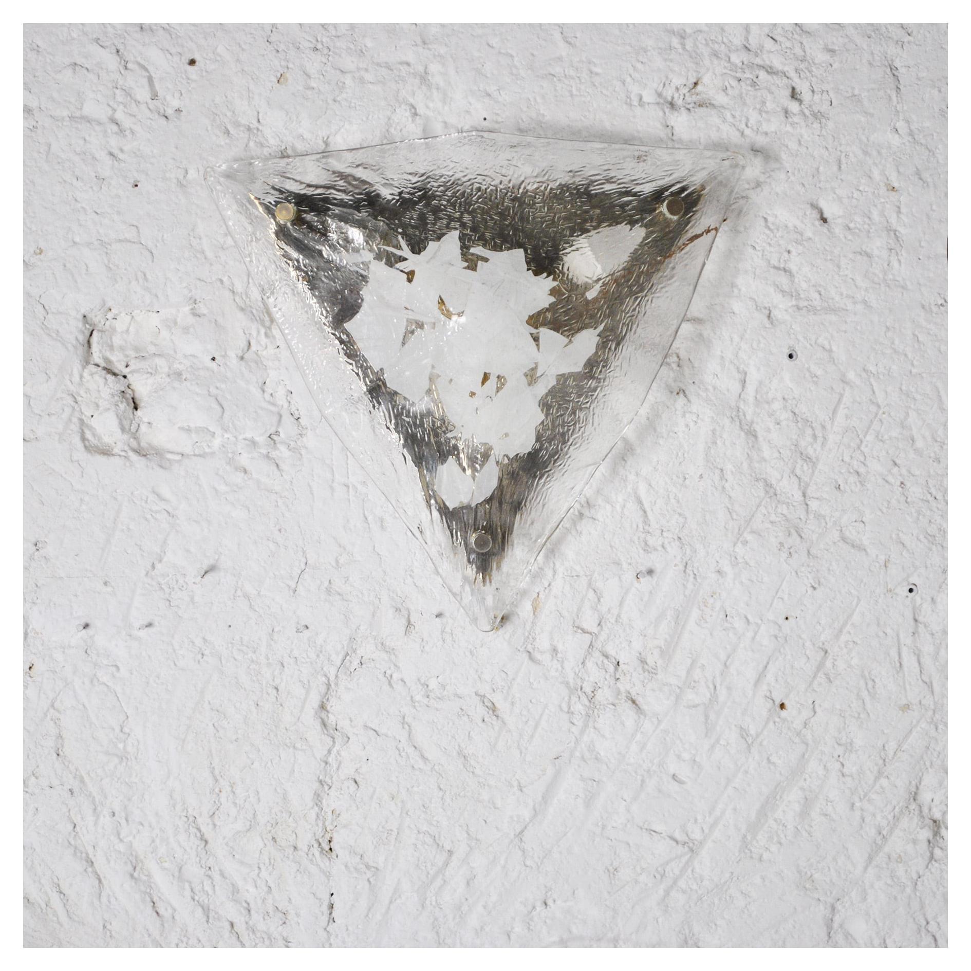 Triangular-shaped wall lamp in worked and white enamelled glass, Vistosi production from the 1960s.