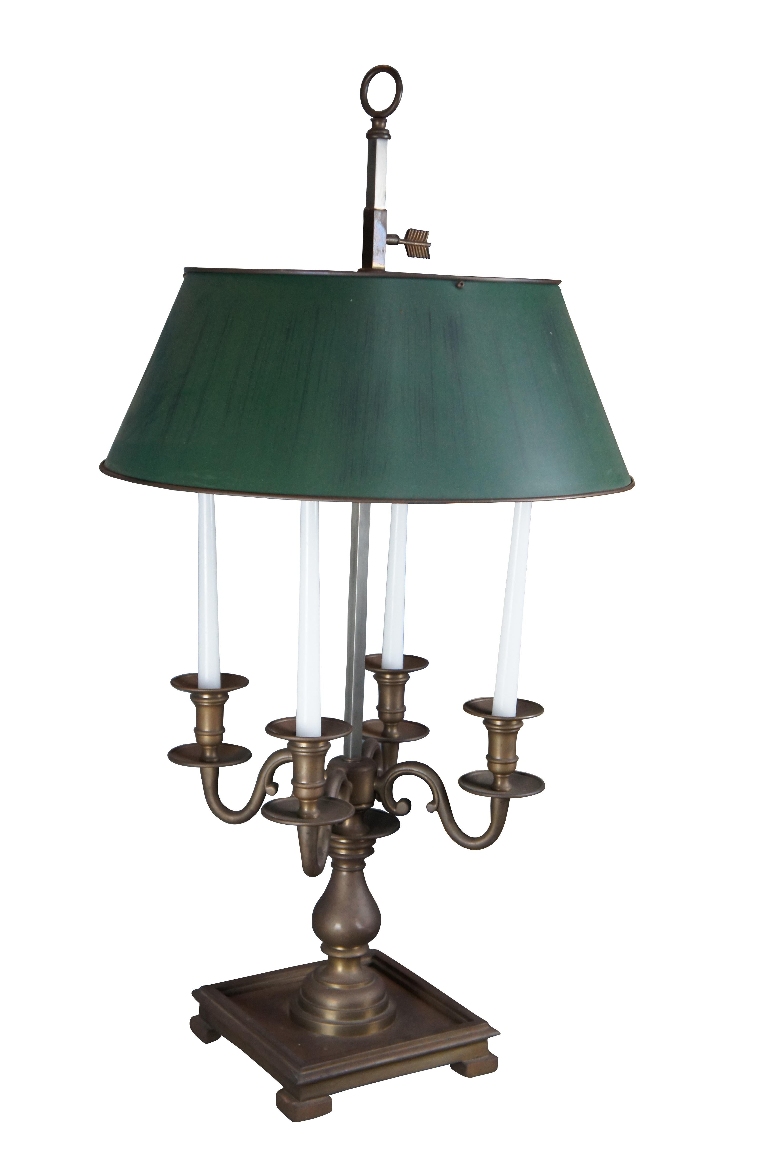 Large and Impressive late 20th century French inspired Bouillotte lamp by Visual Comfort. Features a four arm candelabra over baluster support and square footed base. The lamp features a square shaped column with adjustable brass tole shade finished