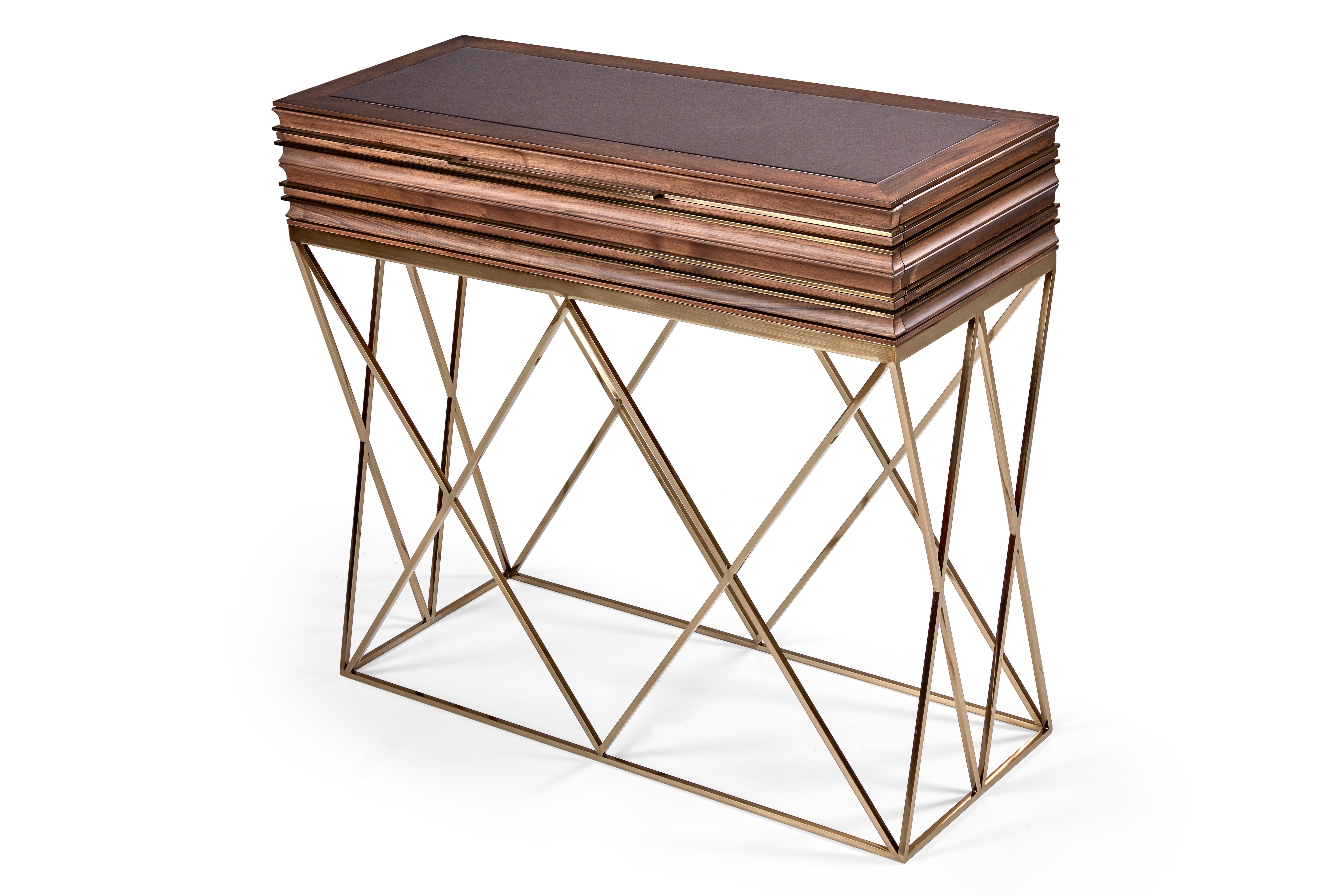 Delicate, yet bold all in one – the visual console is an artistic addition to any space with a carved wood top upon a base of thin crossing bronze bars. The depth allows for placement in a hallway or as a bedroom accent piece.