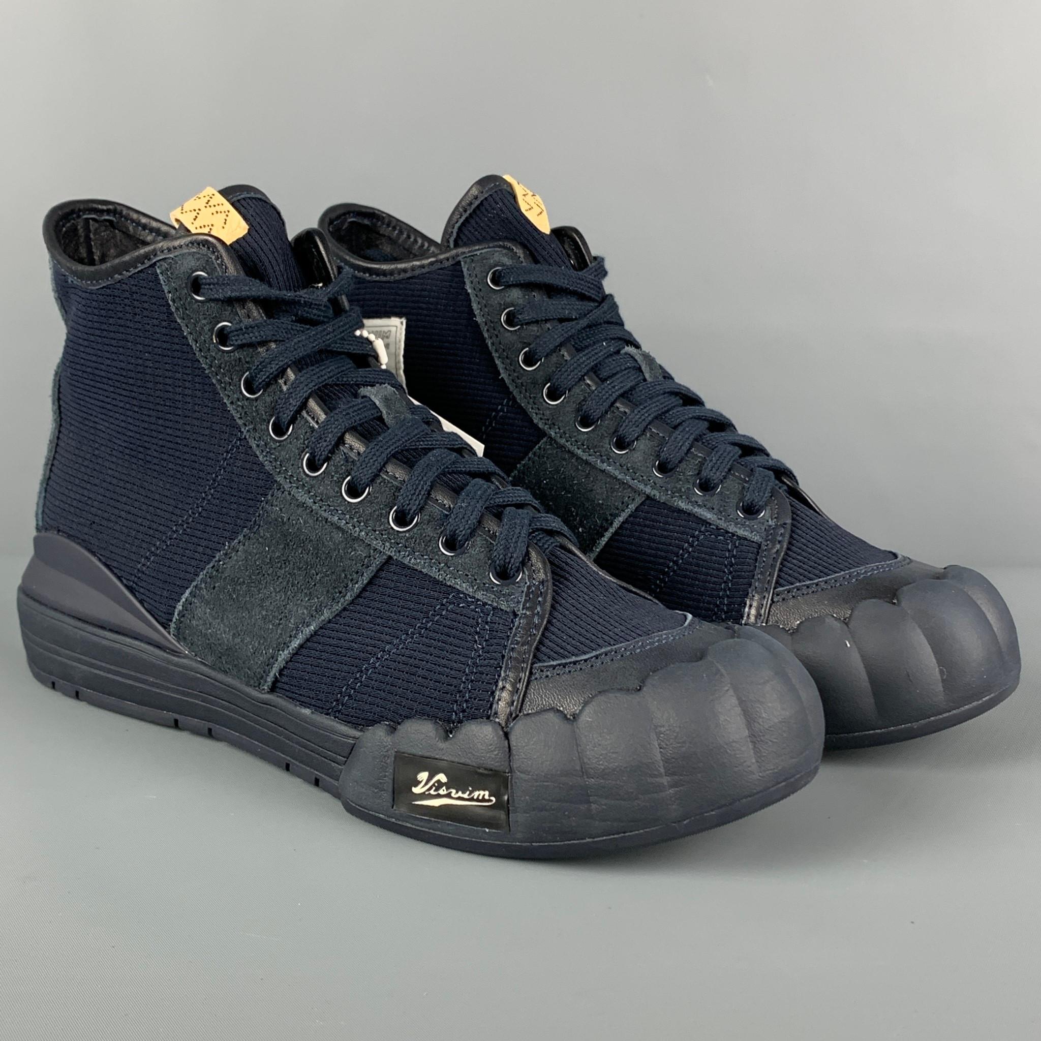 VISVIM 'Lanier' sneakers comes in a navy paneled rib knit with a leather and suede trim throughout featuring a high-top style, rubberized to and heel, leather lining, and a lace up closure. 

New With Box. 
Marked: 10.5
Original Retail Price: