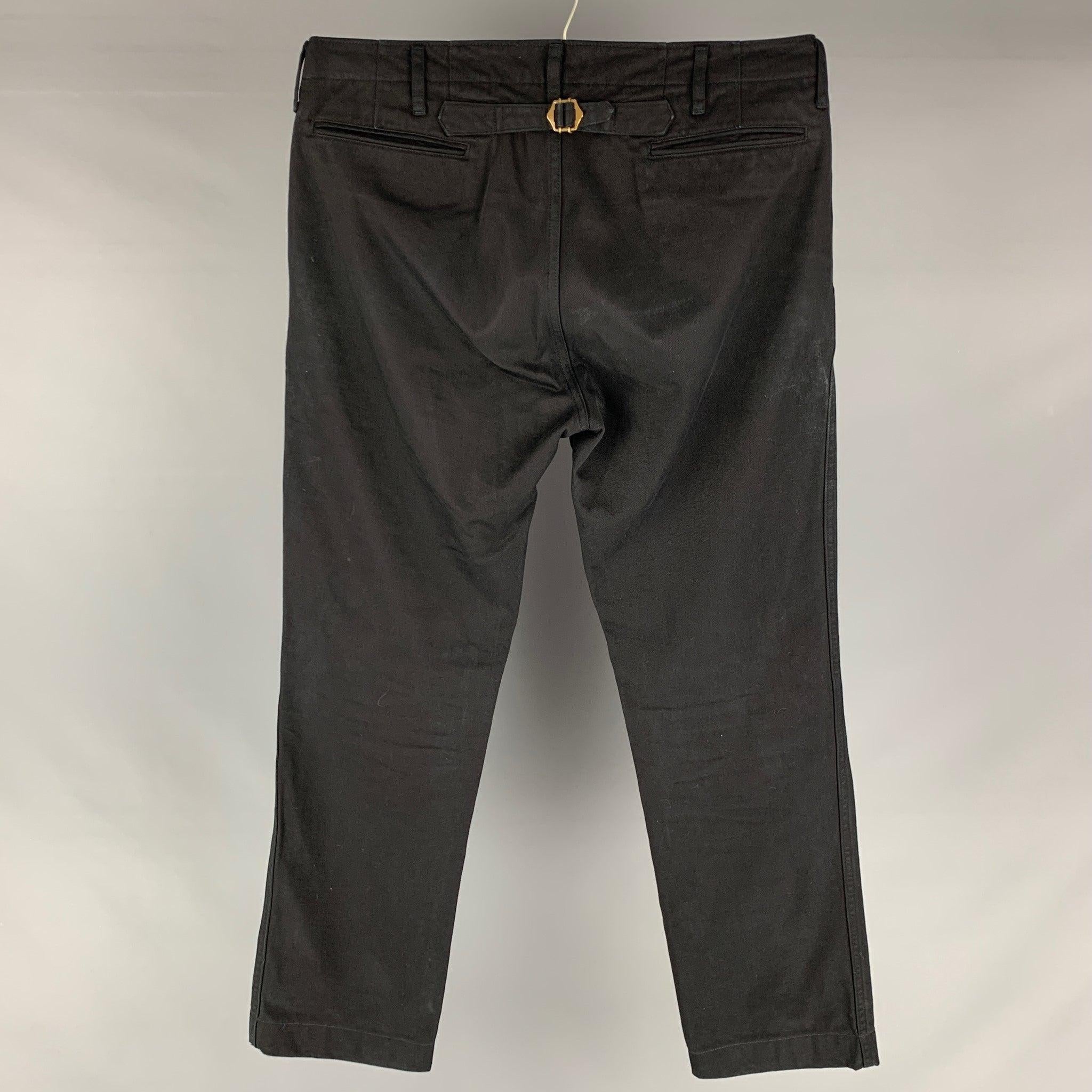 VISVIM Slim Chino casual pants come in black cotton featuring a side pocket, adjustable fit, and straight cut..Very Good Pre-Owned Condition 

Marked:   4 

Measurements: 
  Waist: 36 inches Rise: 11 inches Inseam: 30 inches  
 

  
  
 
Reference: