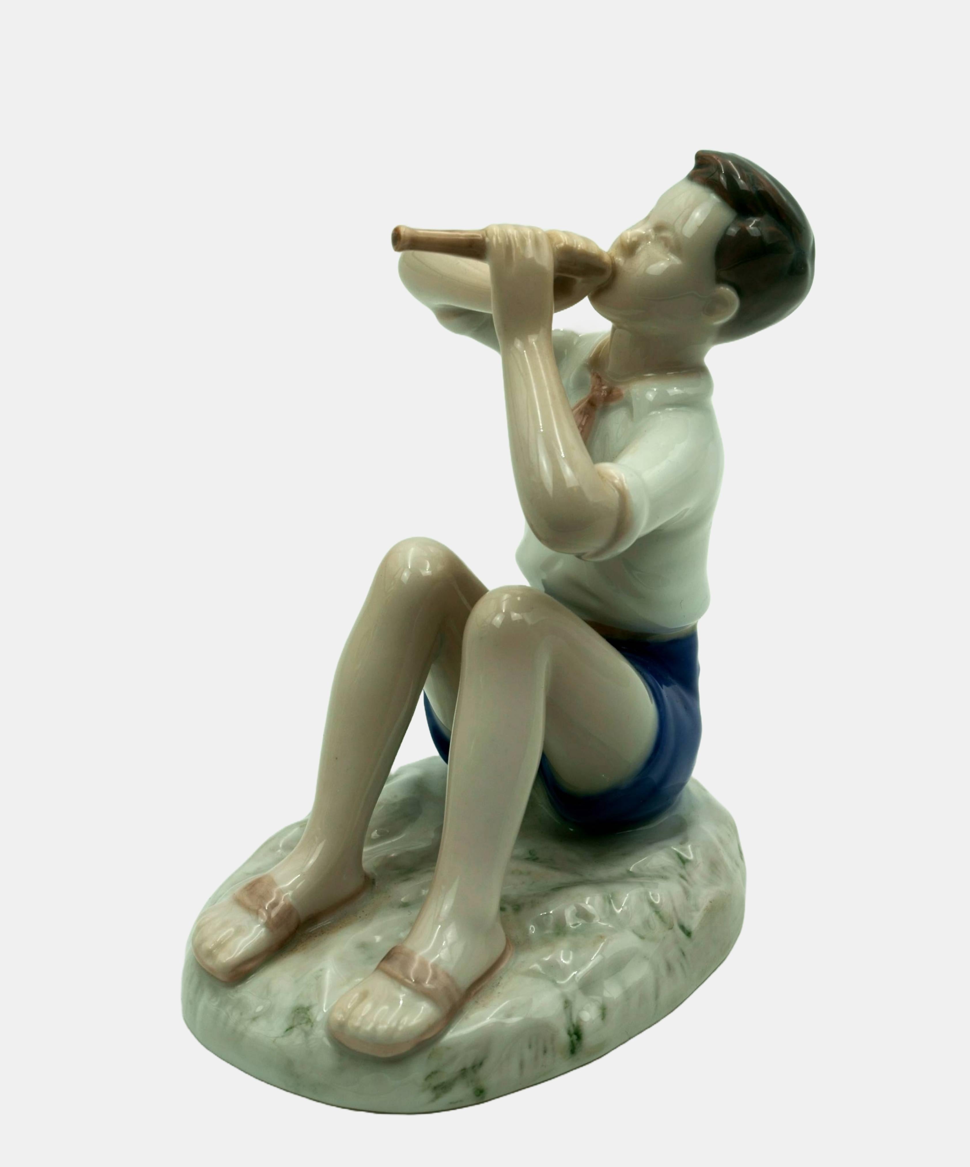 Bing & Grondahl Figure Boy playing the flute / - The lightness of tones - - Realist Sculpture by Vita Birgitte Thymann