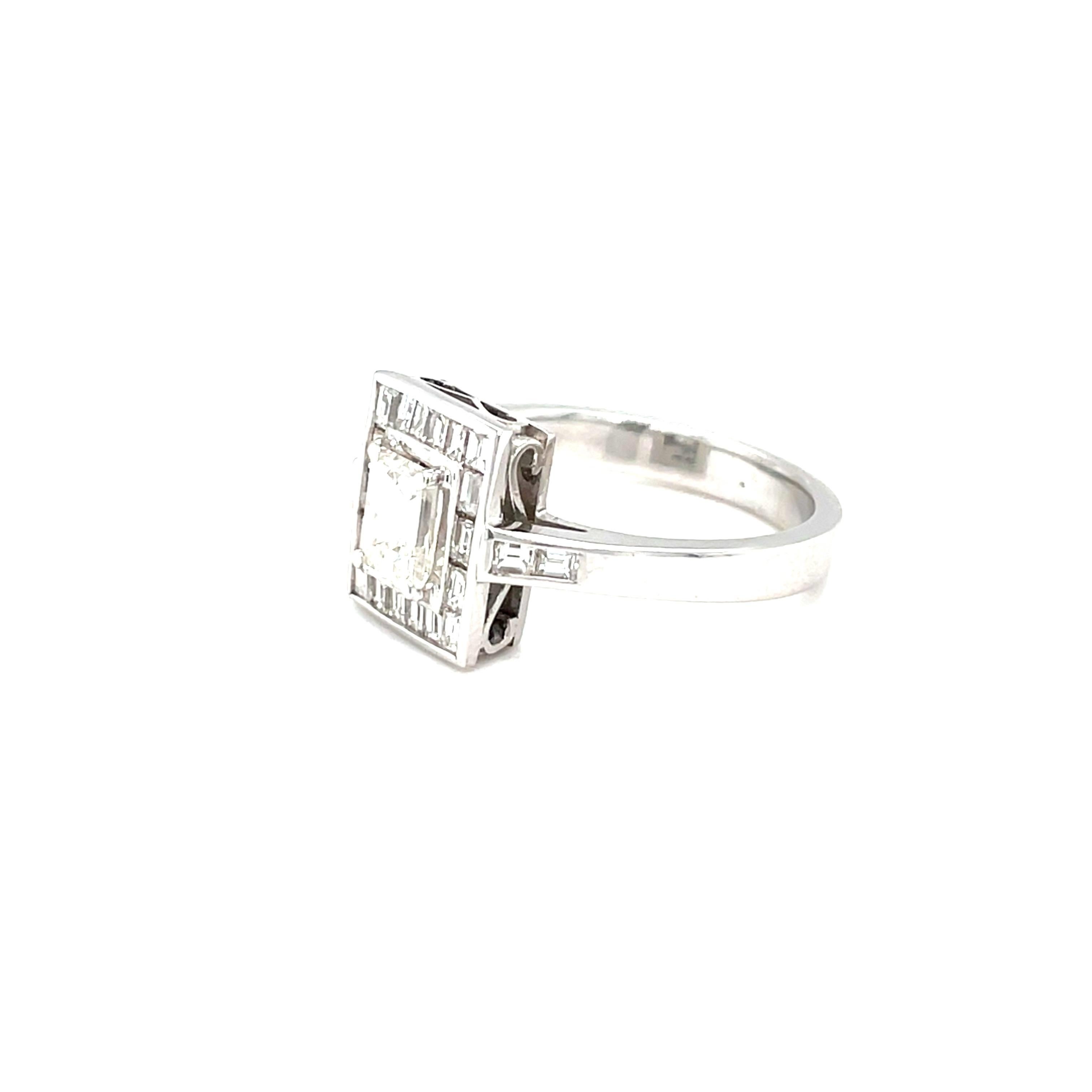 18K white gold engagement ring is from Damier Collection. This beautiful made of an emerald cut colorless diamond 0.65ct decorated by 18 diamonds and 4 diamonds on setting in total of 0.77ct. Stunning for any occasion!

Damier presents unique pieces
