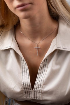 18 Karat White Gold Diamond Flexible Cross Pendant