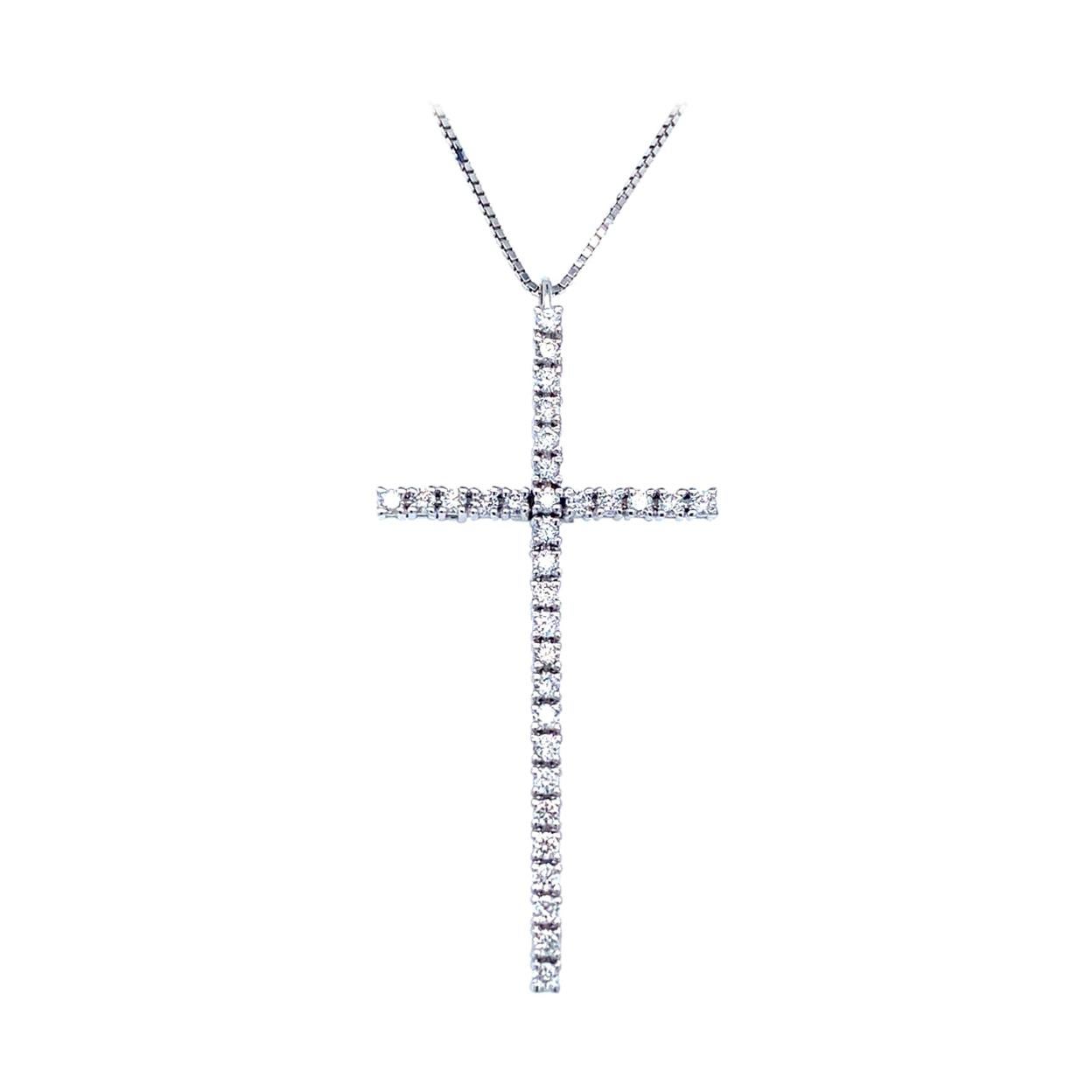 Pendentif croix flexible en or blanc 18 carats et diamants