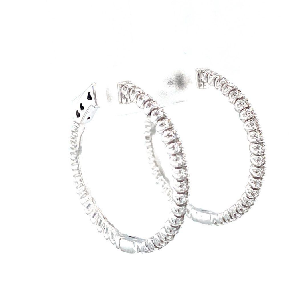 This 18K white gold classy hoop earrings are from our Timeless collection. These hoop earrings are made of natural white diamonds in total of 1.12 Carat. Total metal weight is 9.0 gr. Diameter is 3cm. Great at any event. 

The Timeless Collection