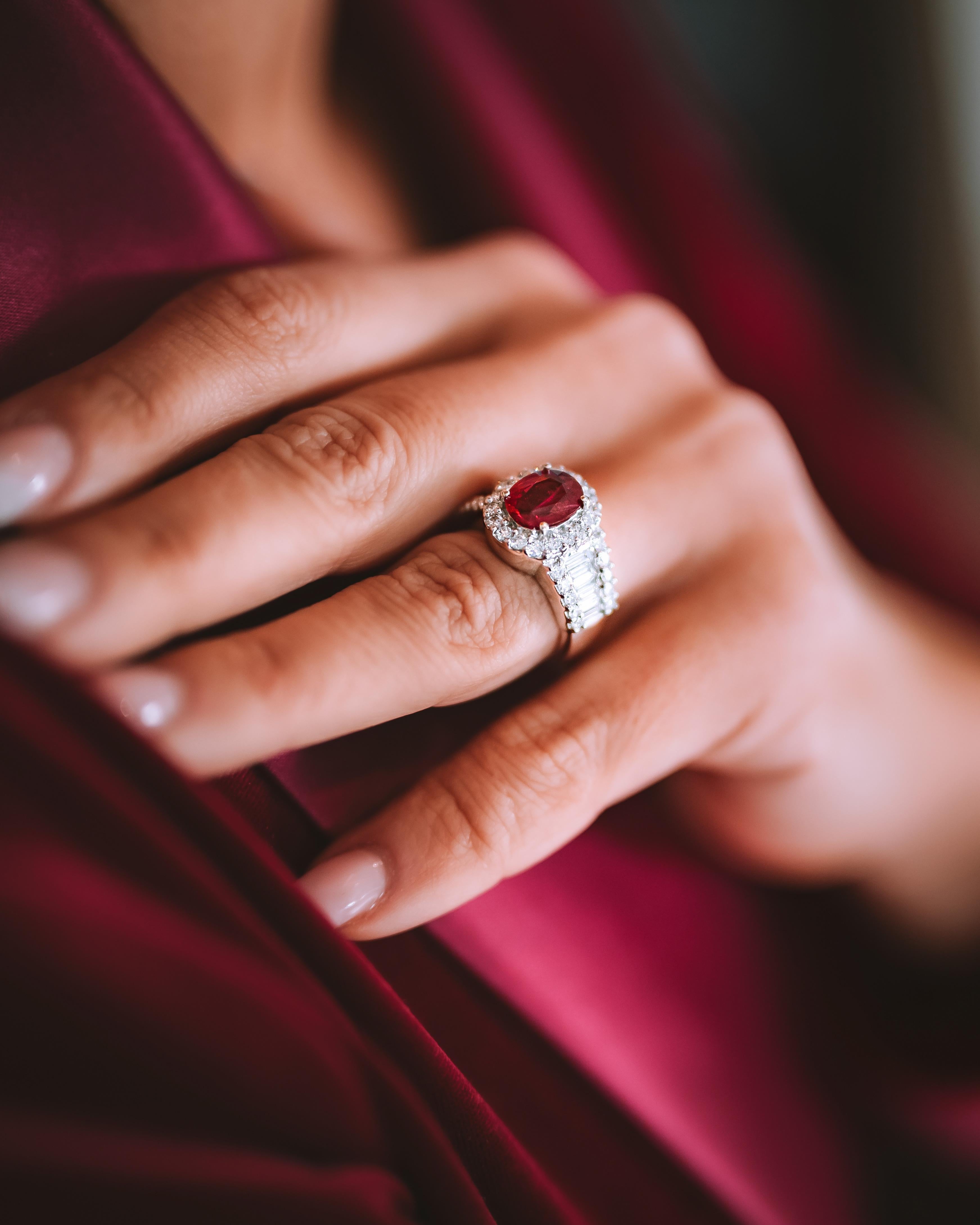 18K white gold cocktail ring is from Divine Collection. This extraordinary piece of jewellery is a detailed combination of beautiful oval natural ruby 2.1 Carat and natural white diamonds in total of 1.6 Carat .Total metal weight is 9.6 gr. This