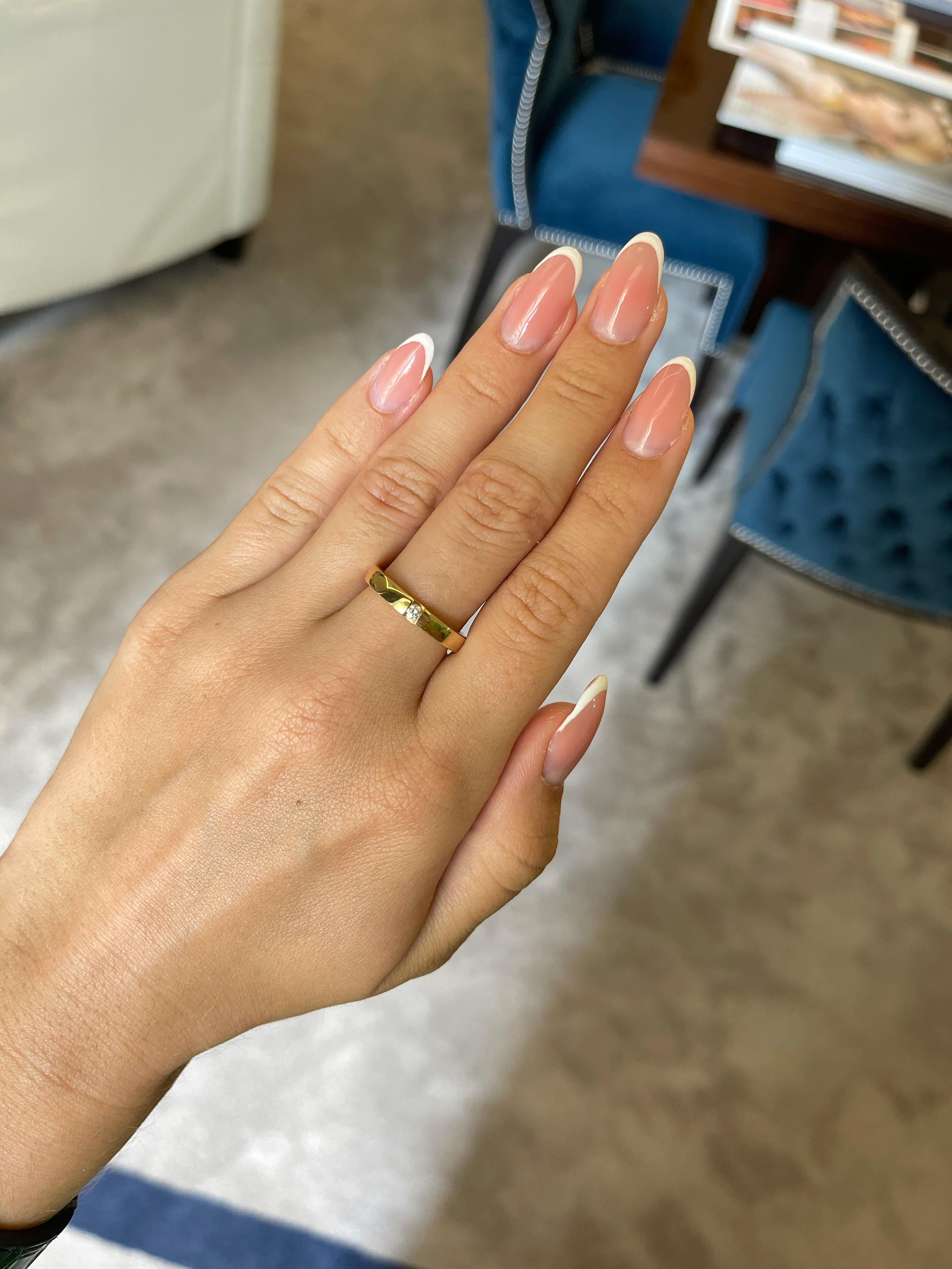18K yellow gold band ring is from Timeless Collection. This elegant band ring is made of natural white diamond in total of 0.07 Carat. Total metal weight is 6.4 gr. Perfect for bridal occasion!

The Timeless Collection was inspired by the endless