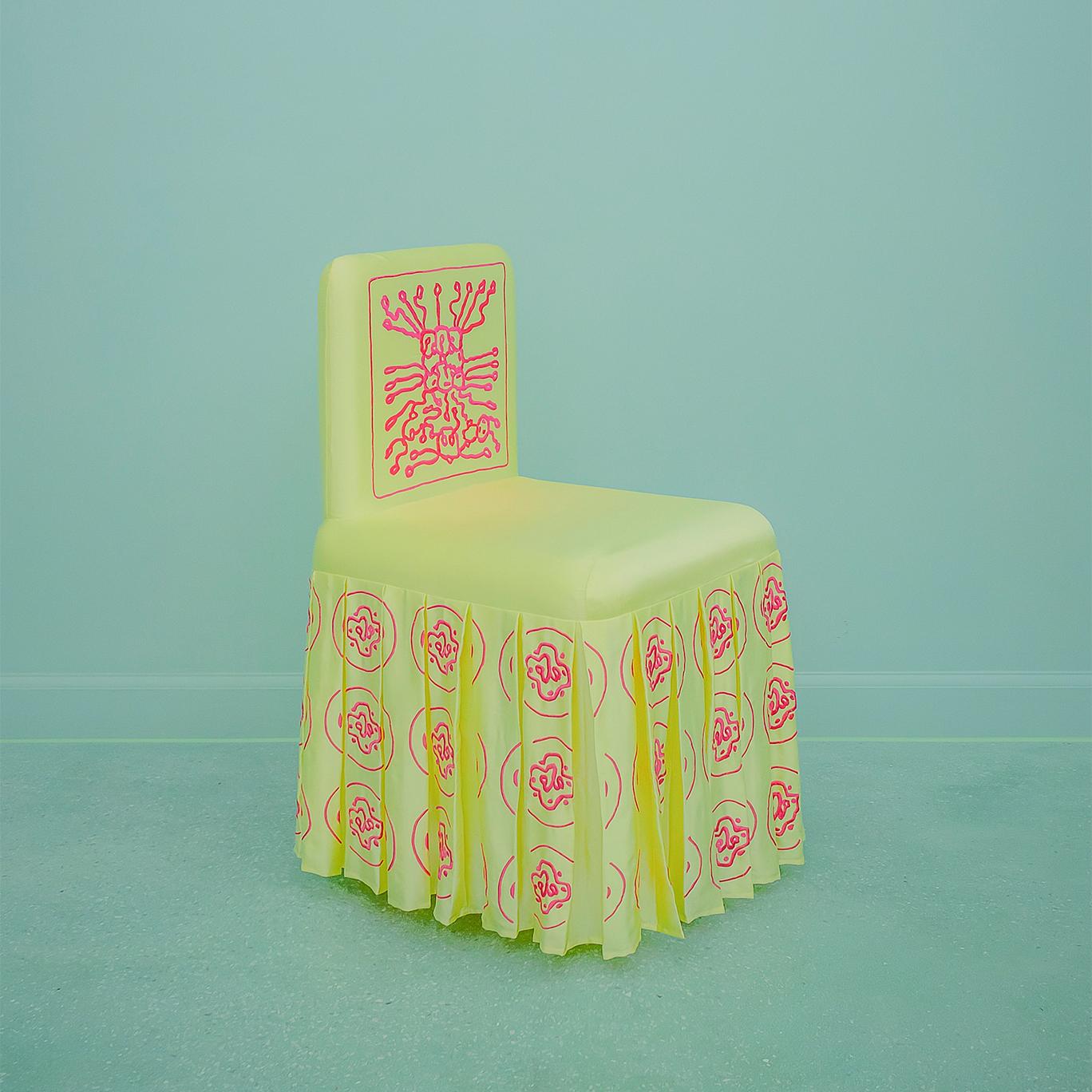 “Vitamin-B12-Omega-3” chair is inspired by the artistic form of classical Chinese furniture such as those in temples and imperial courts. It is completely covered in fine silk, hand-embroidered with the molecular geometry of Vitamin B12 (critical to
