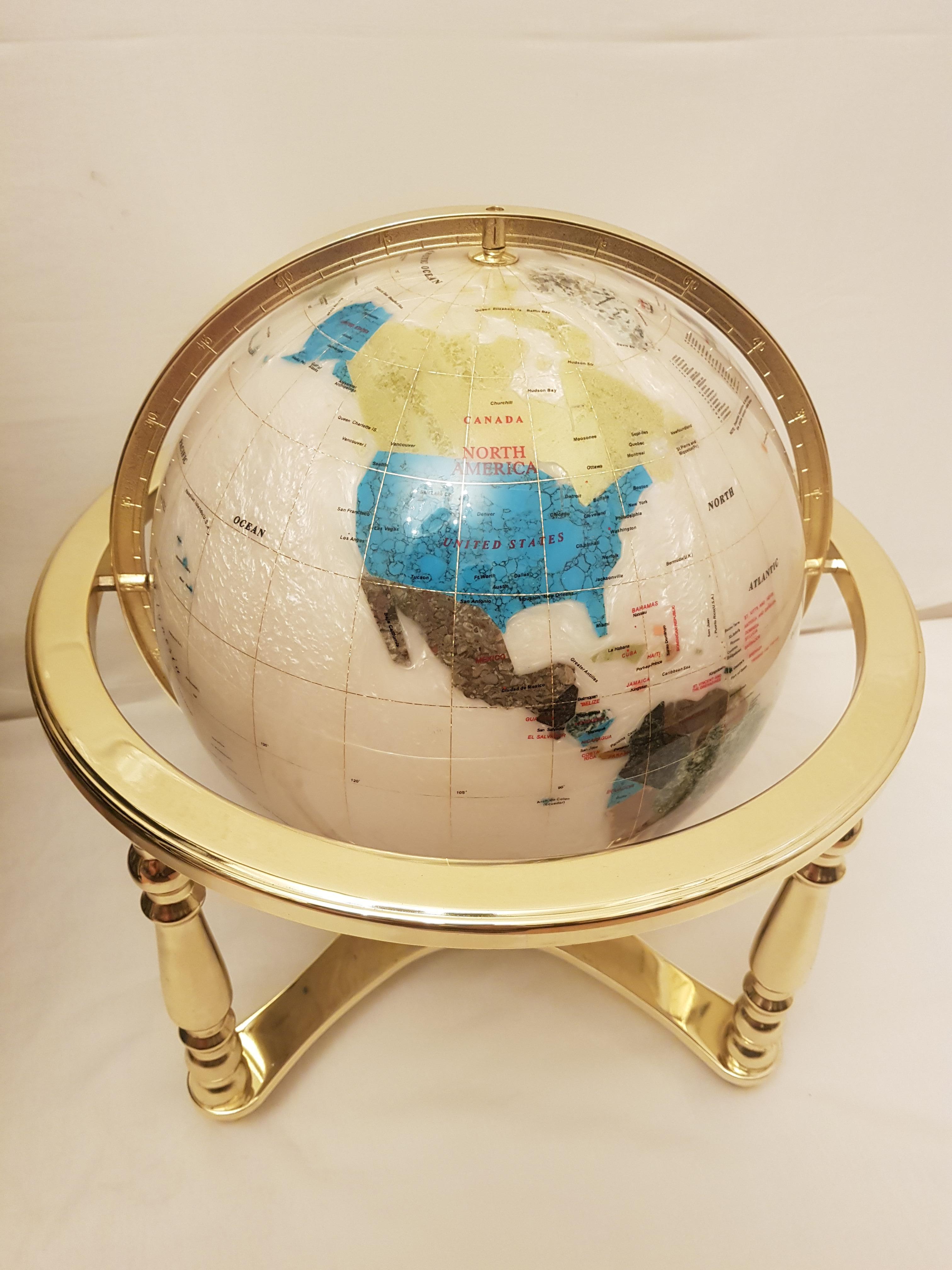 Vitange Alexander Kalifano mother of pearls gemstone globe, each country on the globe is inlaid from a different stone and the stones are individually cut and ground to exacting intrlocking shapes, polished and set into this exquisite piece of art