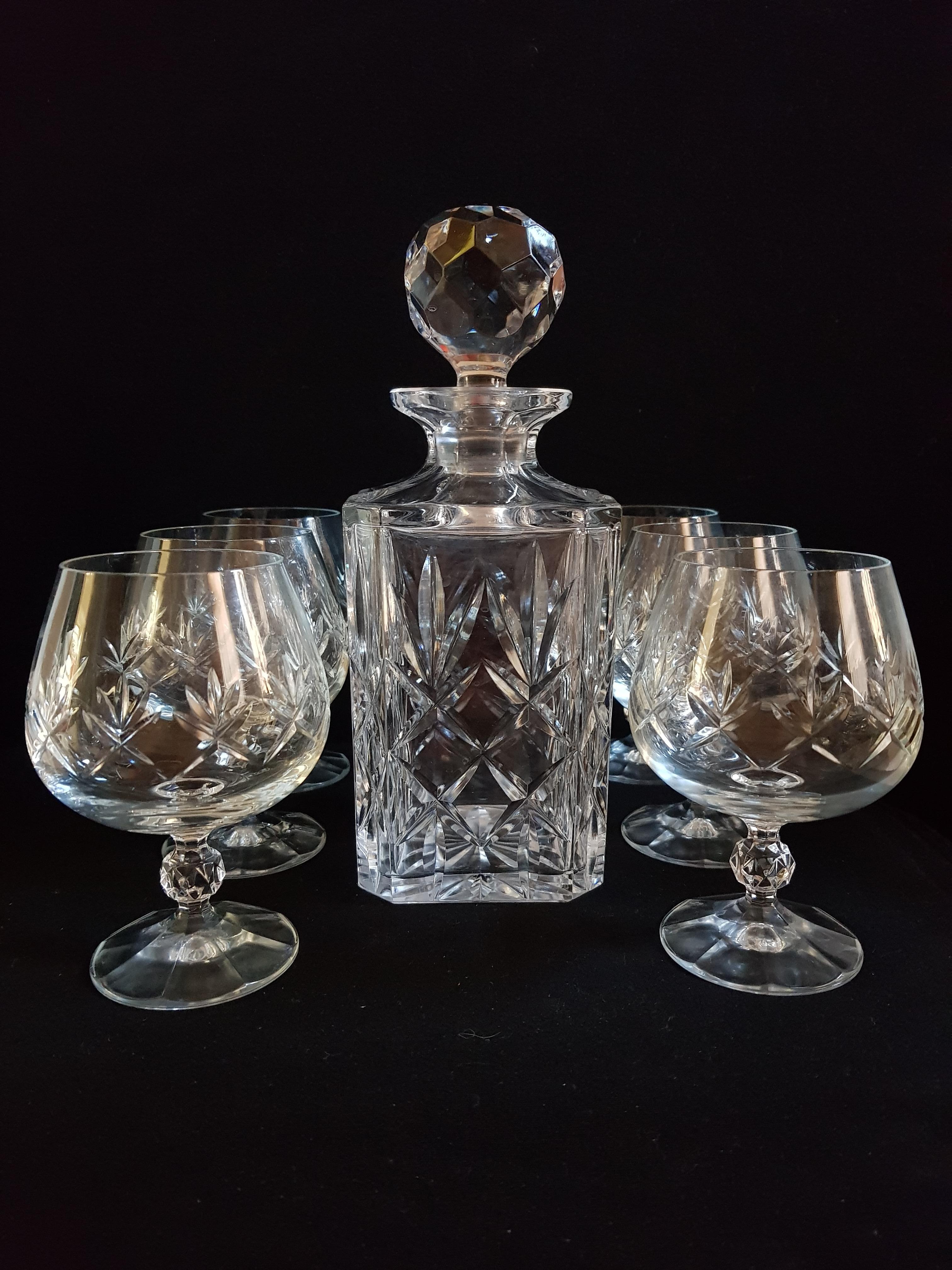 Beautiful vitange Bohemian crystal drinking set, decanter and stopper with 6 glasses brilliant condition.
