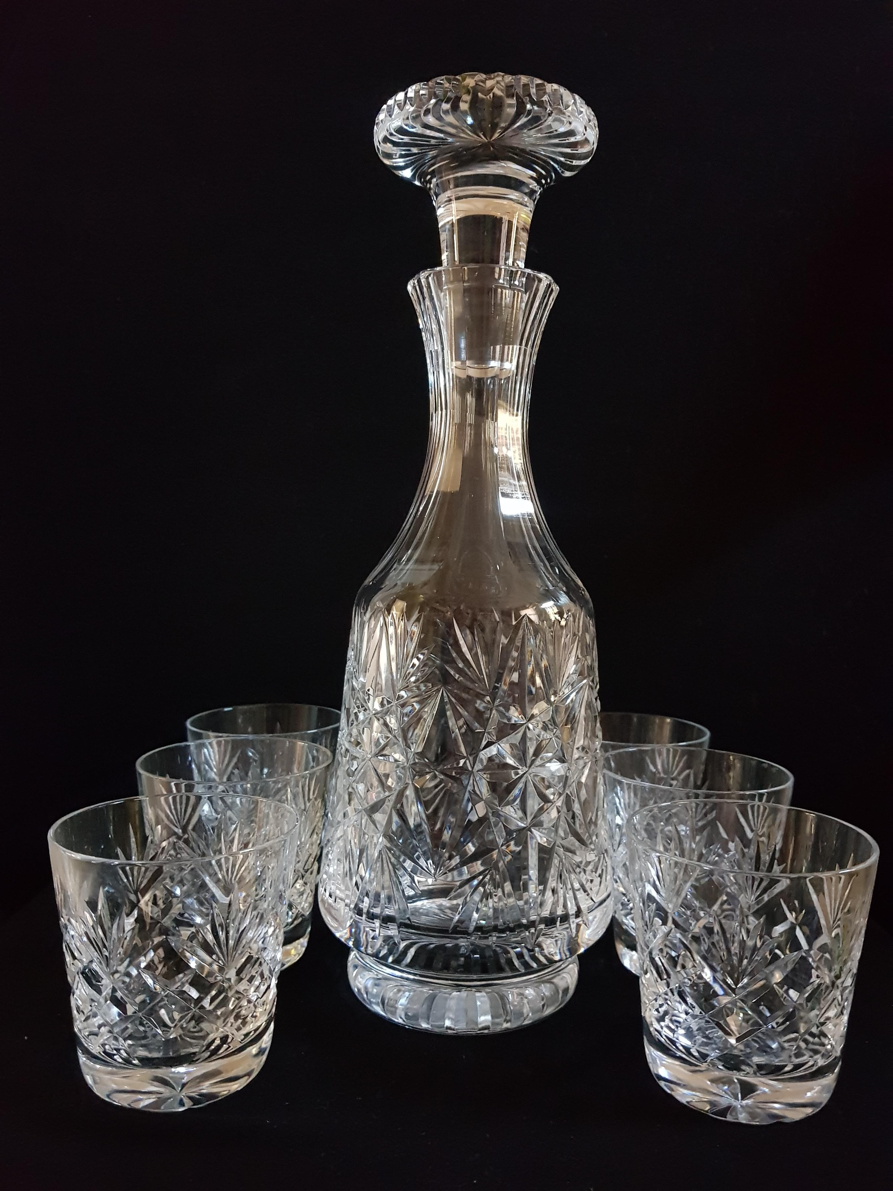 Beautiful vitange Bohemian brilliant hand cut crystal drinking set, decanter with stopper and 6 glasses, brilliant condition. The decanter have 32 cm tall and 12 cm width and glasses have 8 cm tall and 8 cm width.