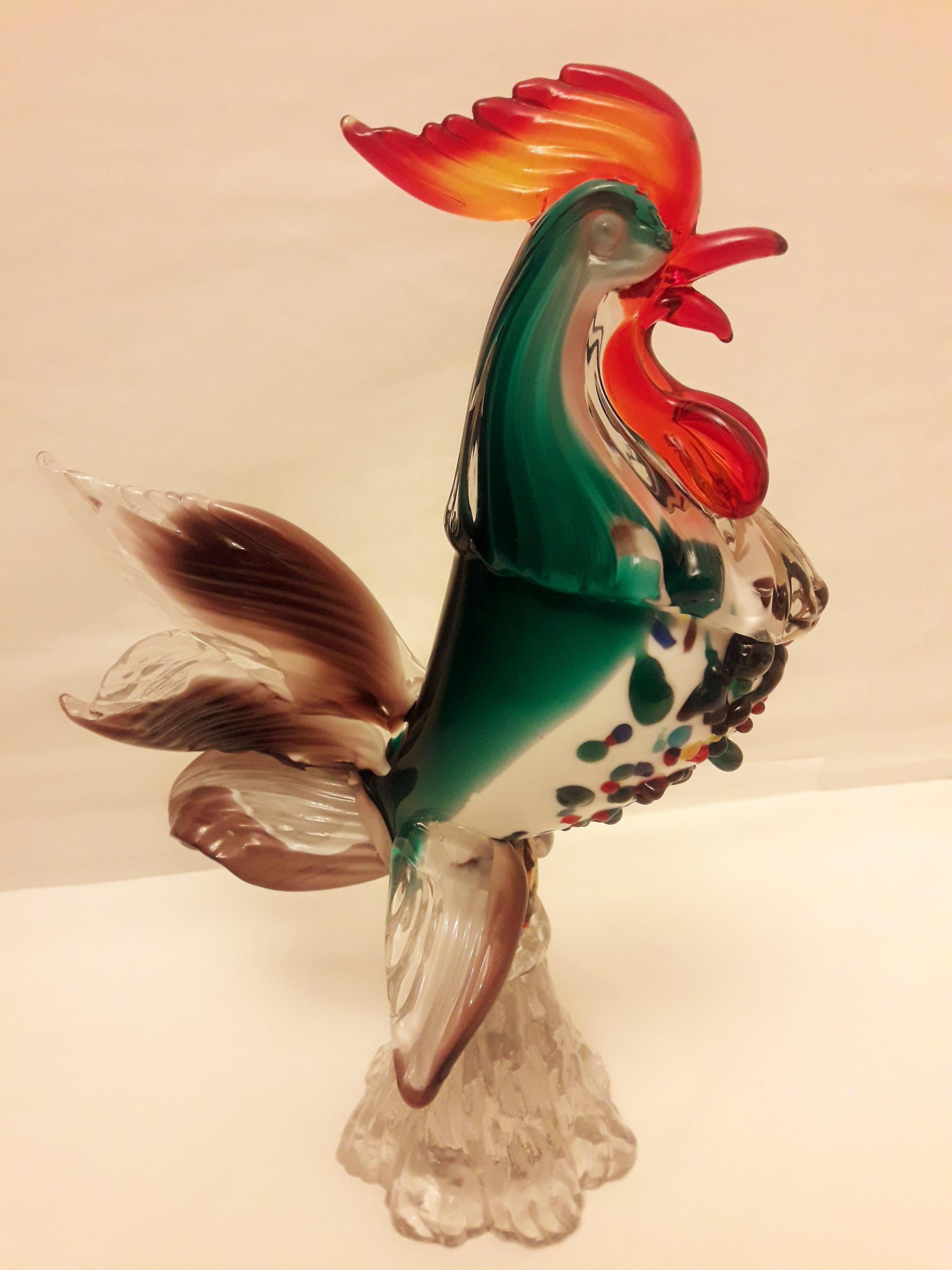 Beautiful genuine murano glass rooster jeweled and silver leaf on the breast brilliant condition.