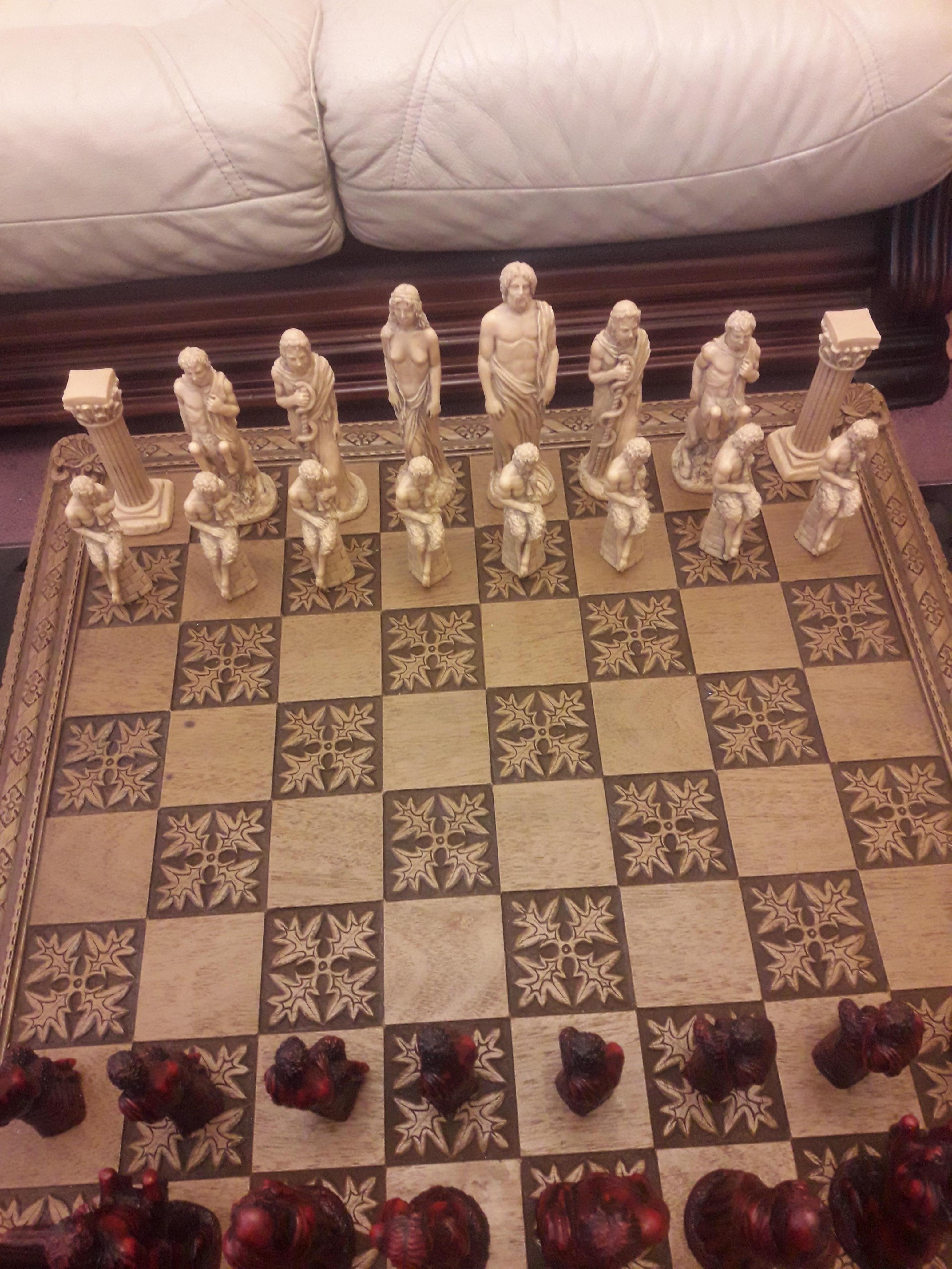 Beautiful vitange hand carved resin chess board brilliant condition beautiful home decor.