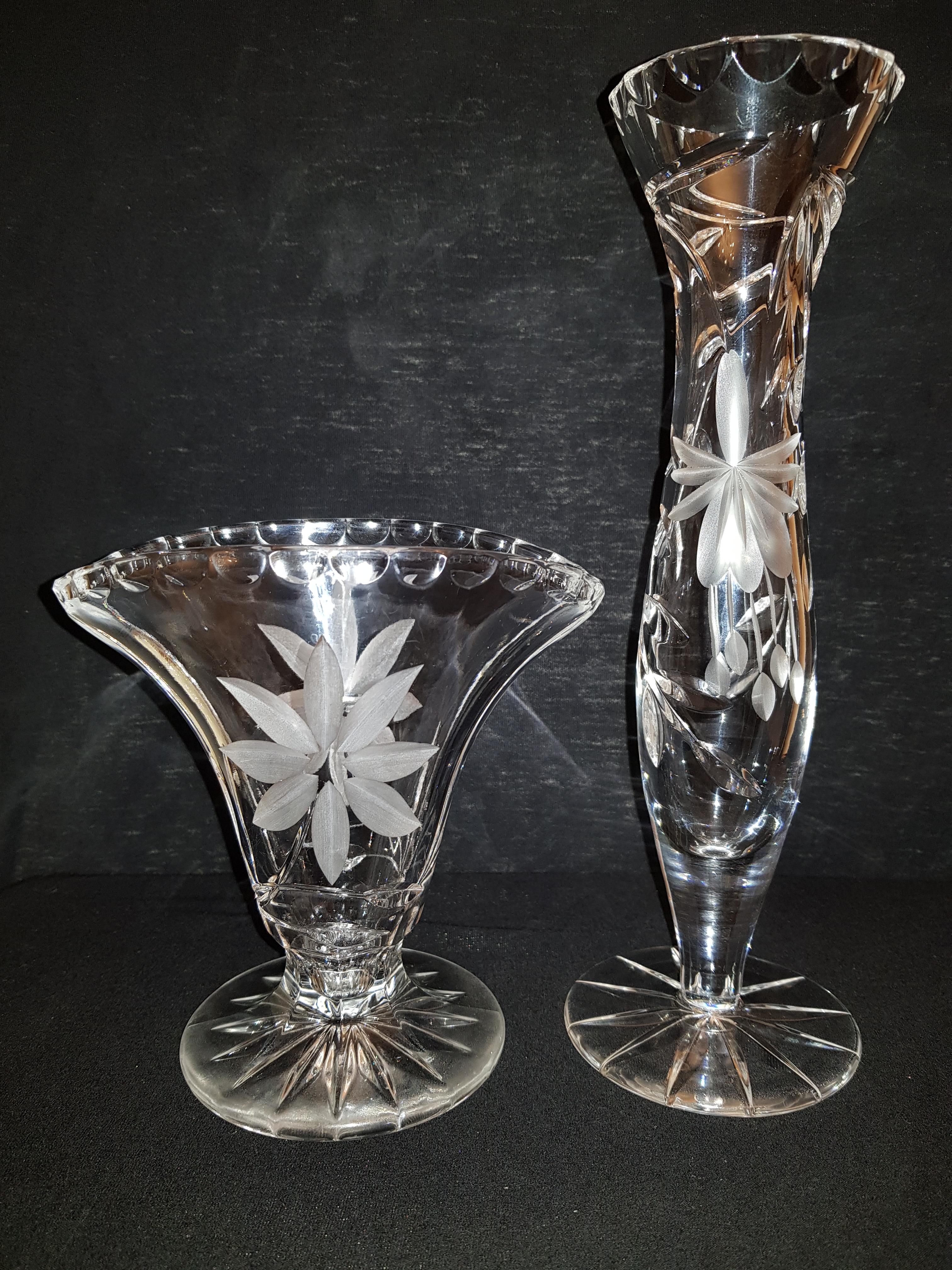 Beautiful set of two Bohemian hand cut floral vases 25 cm tall and 15 cm tall brilliant condition beautiful home decor.